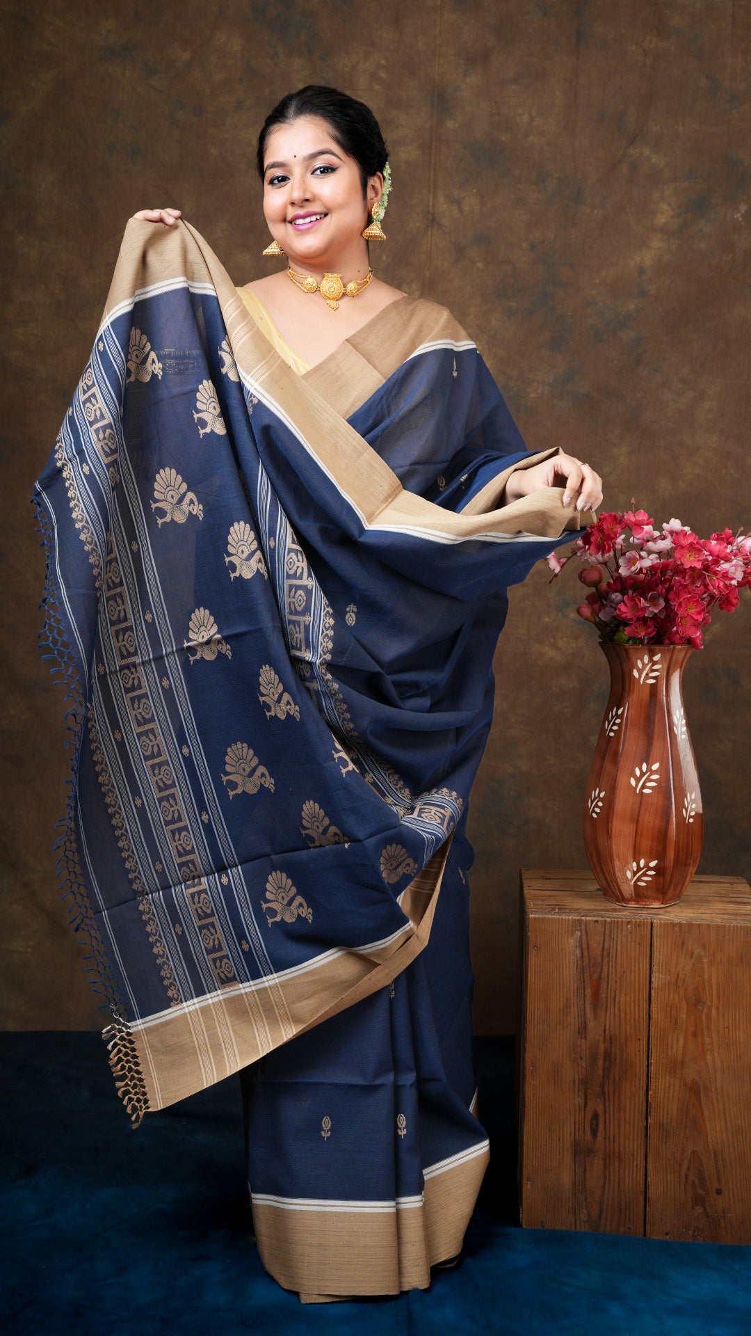 A navy blue tangail saree