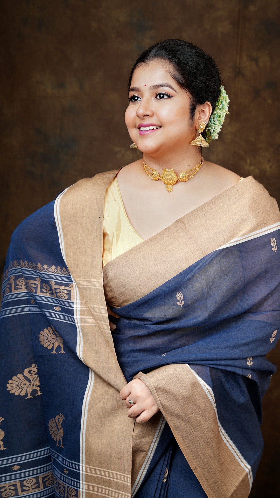 A navy blue tangail saree