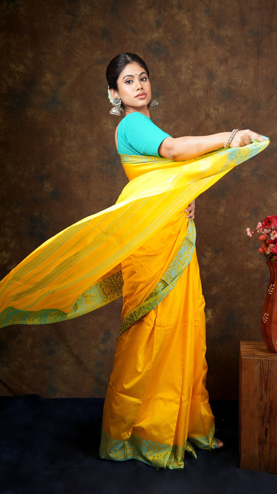 A yellow silk saree
