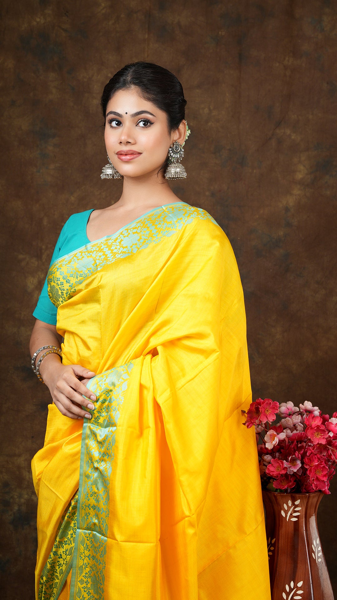 A yellow silk saree