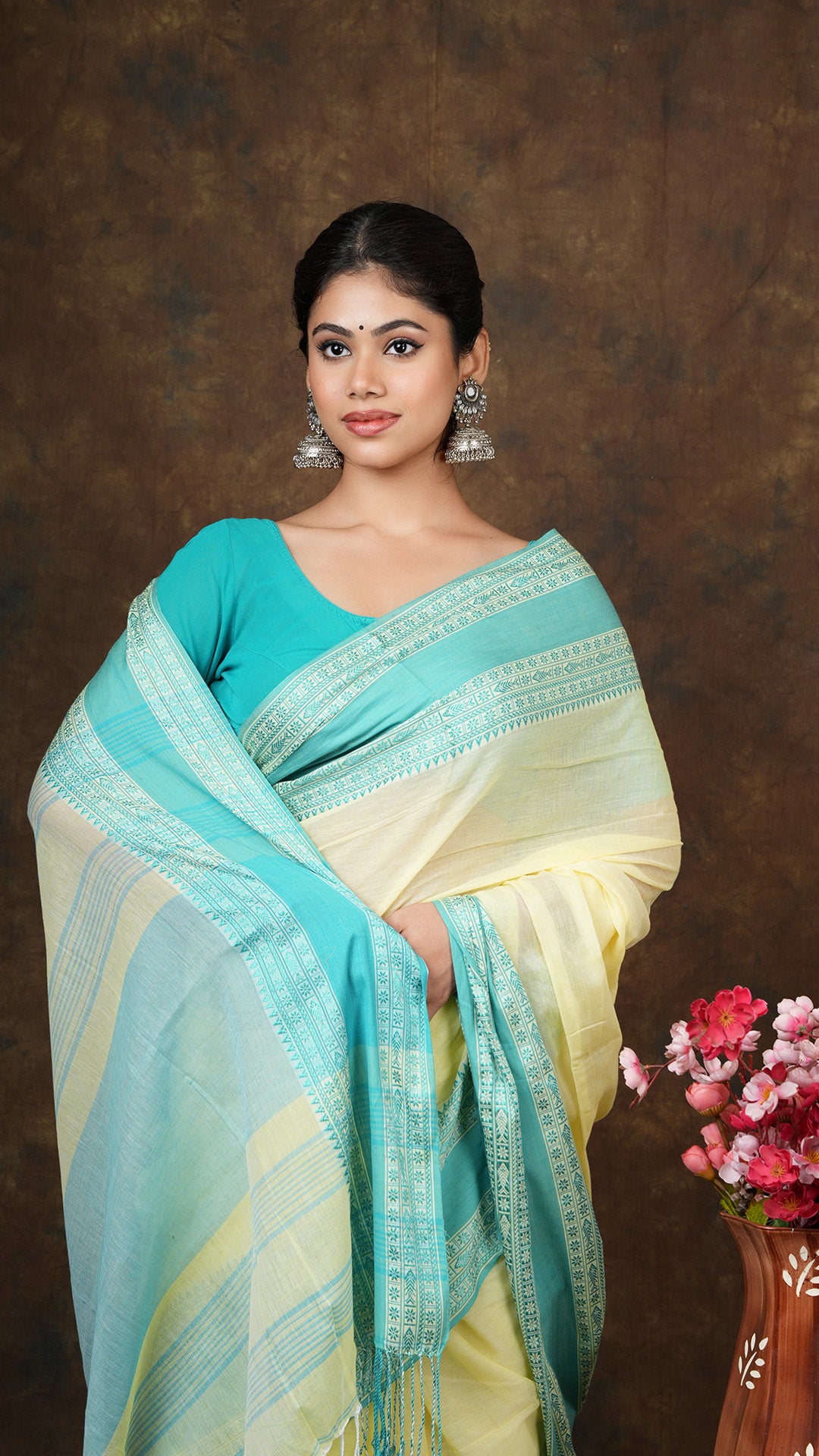 A lemon yellow saree