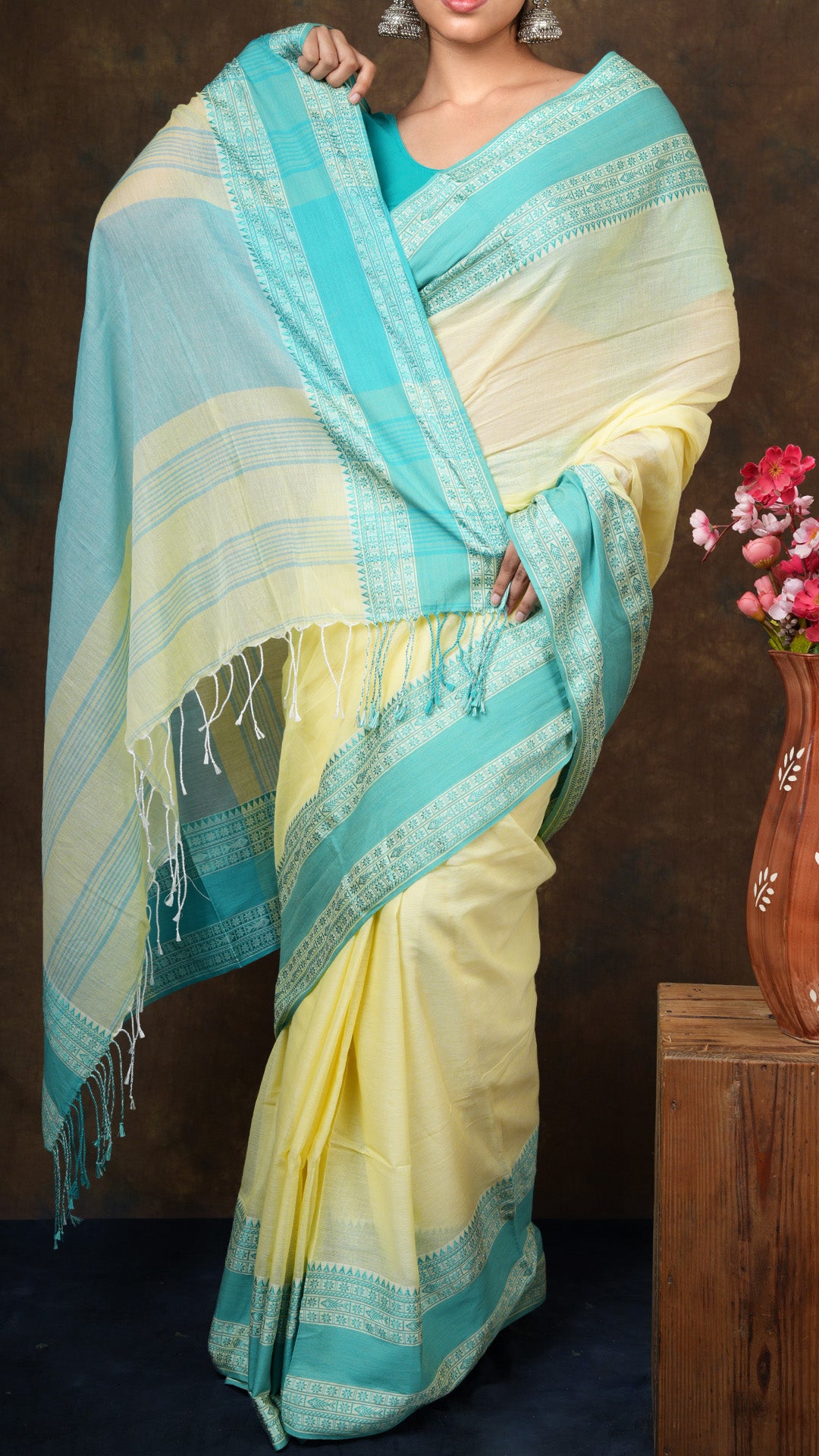 A lemon yellow saree