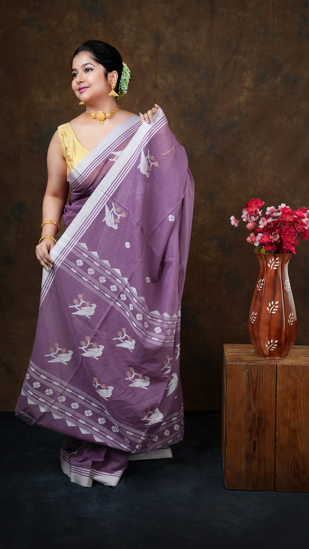 A deep mauve tangail saree