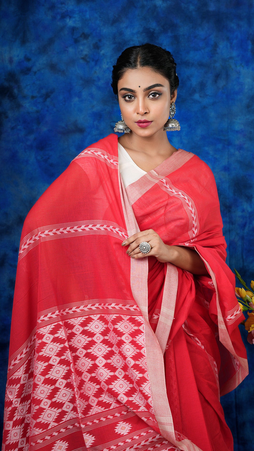 A red colour soft cotton saree