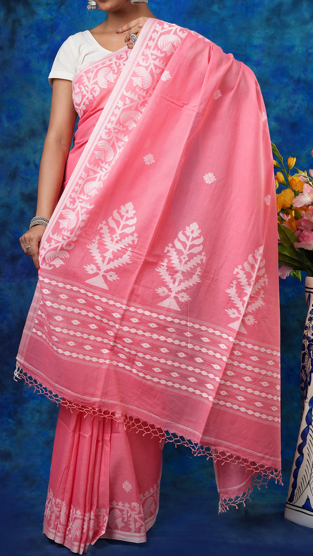 A peach coloured saree