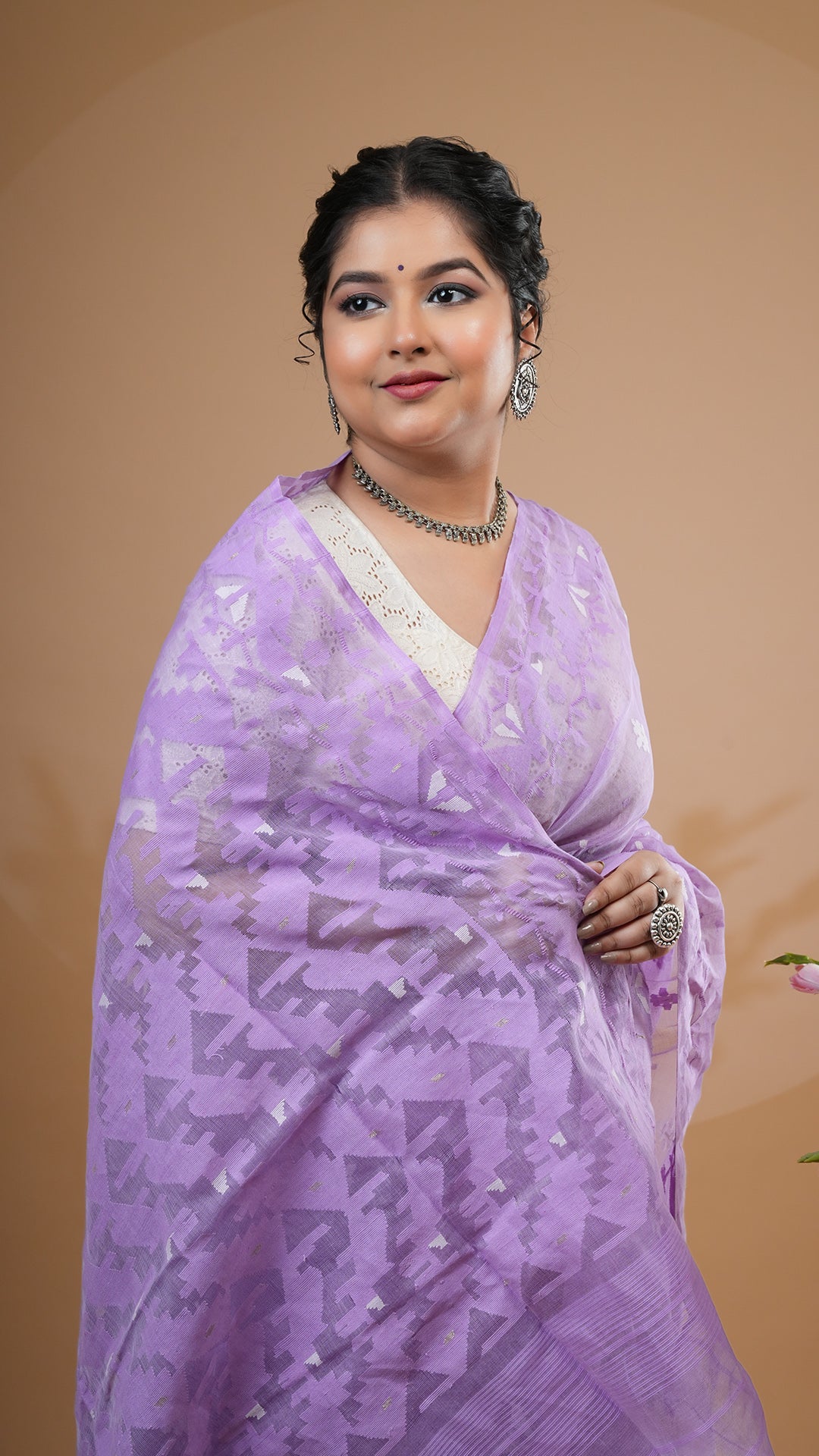 A mauve jamdani saree