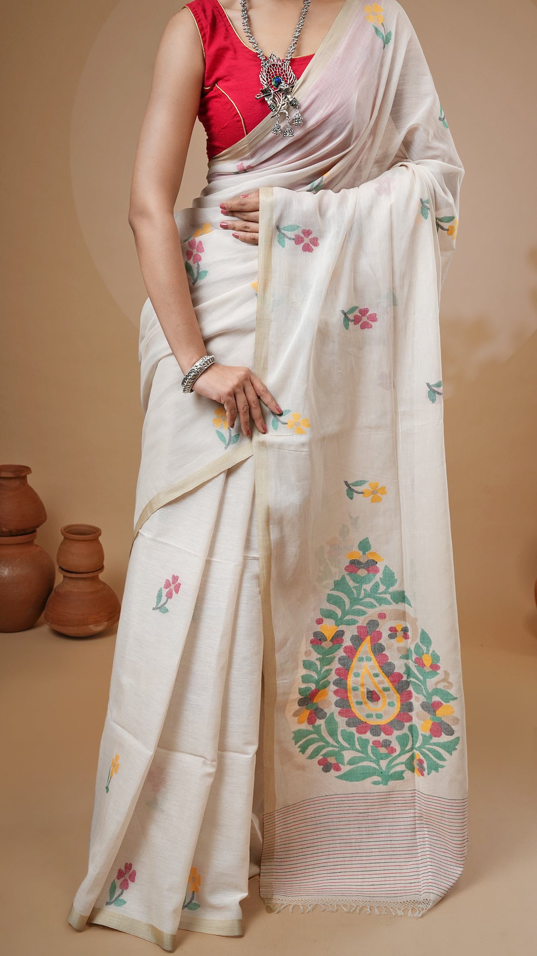 A multi coloured dhakai saree