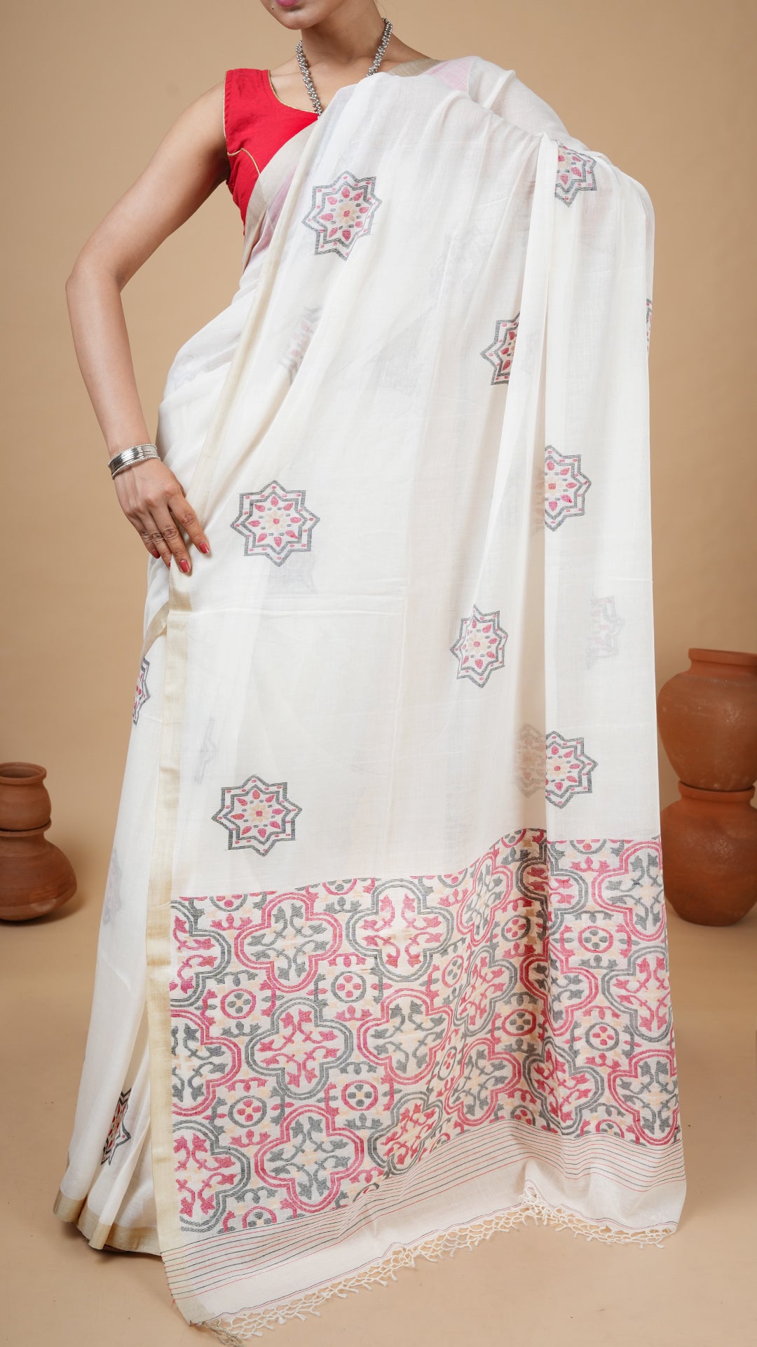 An off white with black and red dhakai