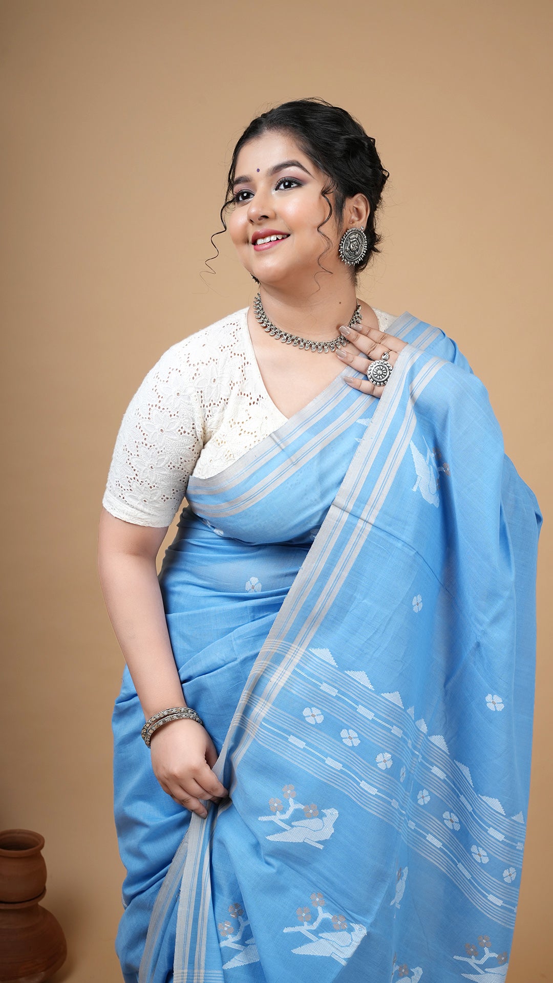 A sky blue tangail saree