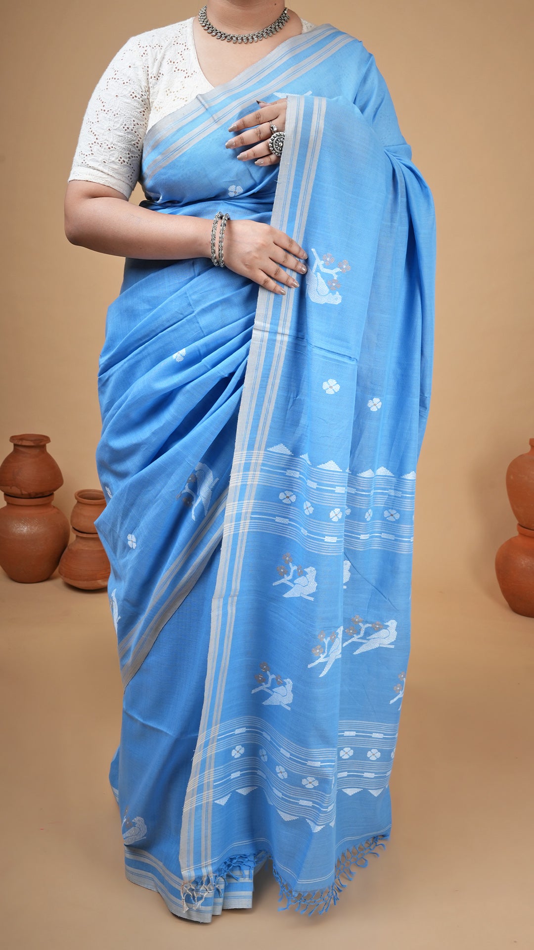 A sky blue tangail saree