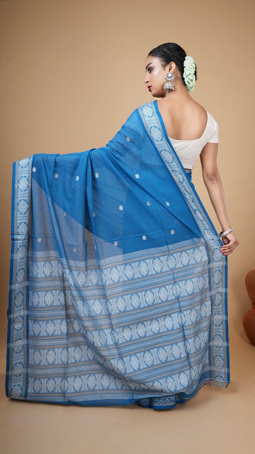 A soft cotton blue saree