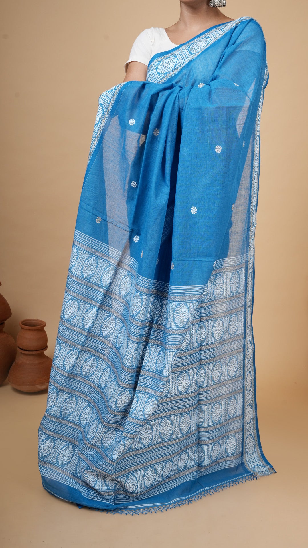 A soft cotton blue saree
