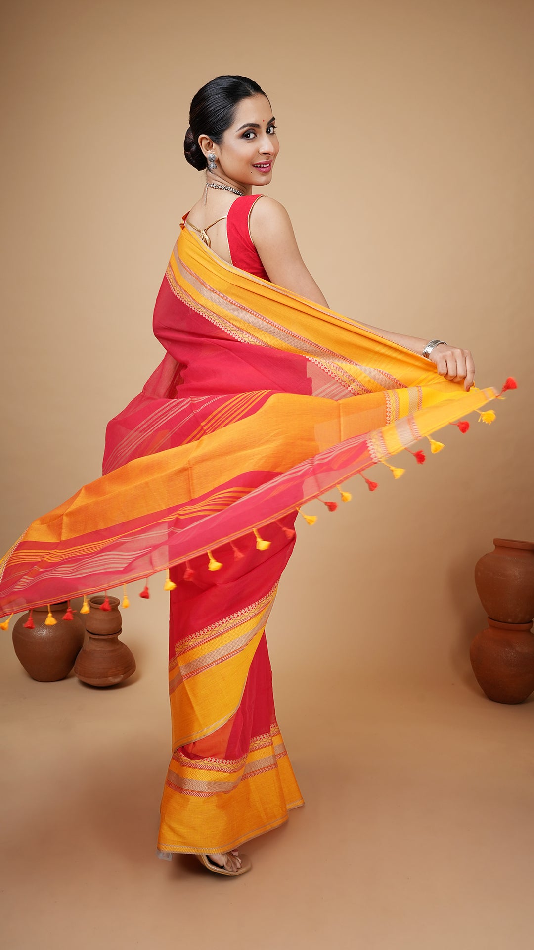 A red tangail saree