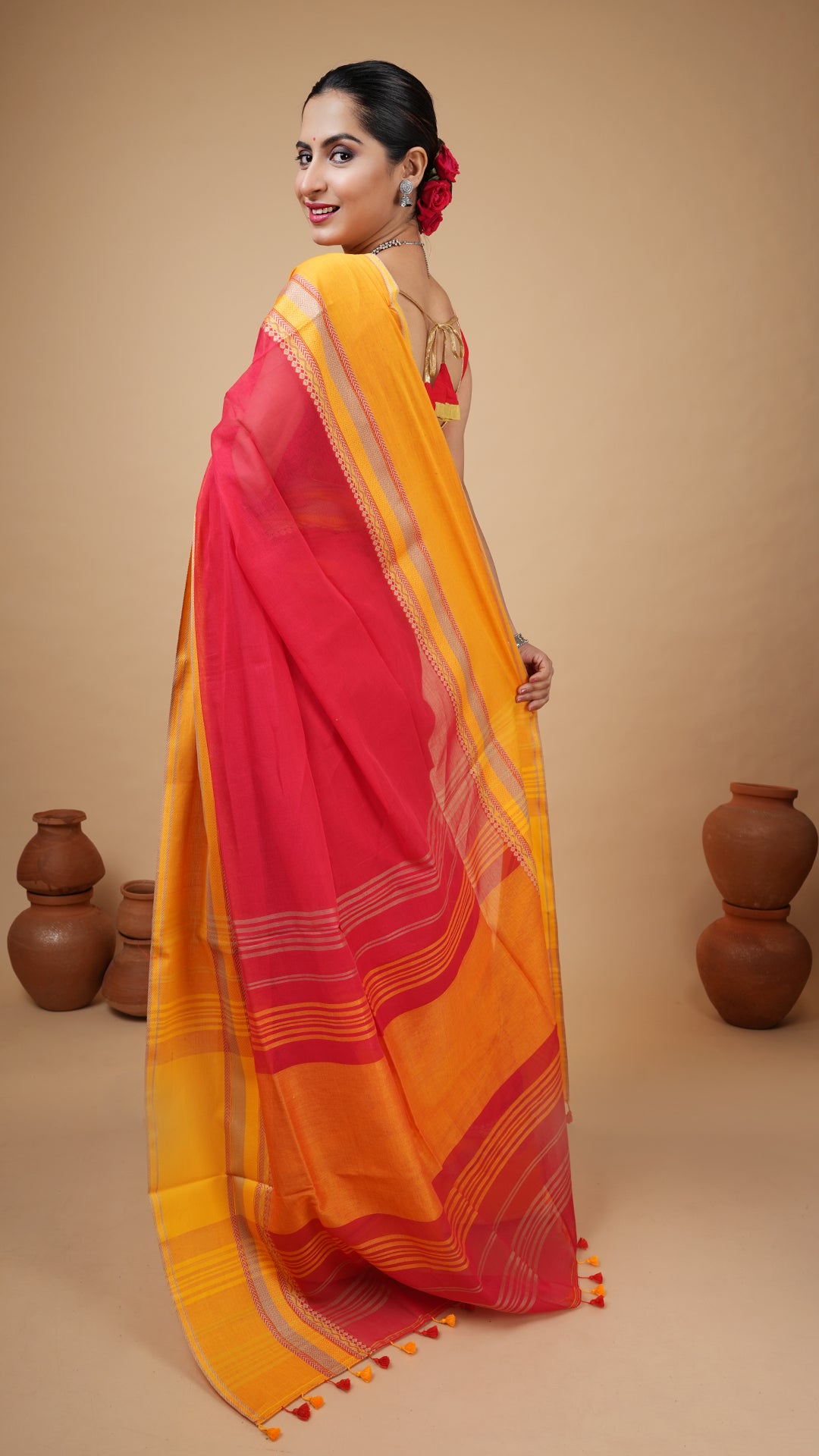 A red tangail saree