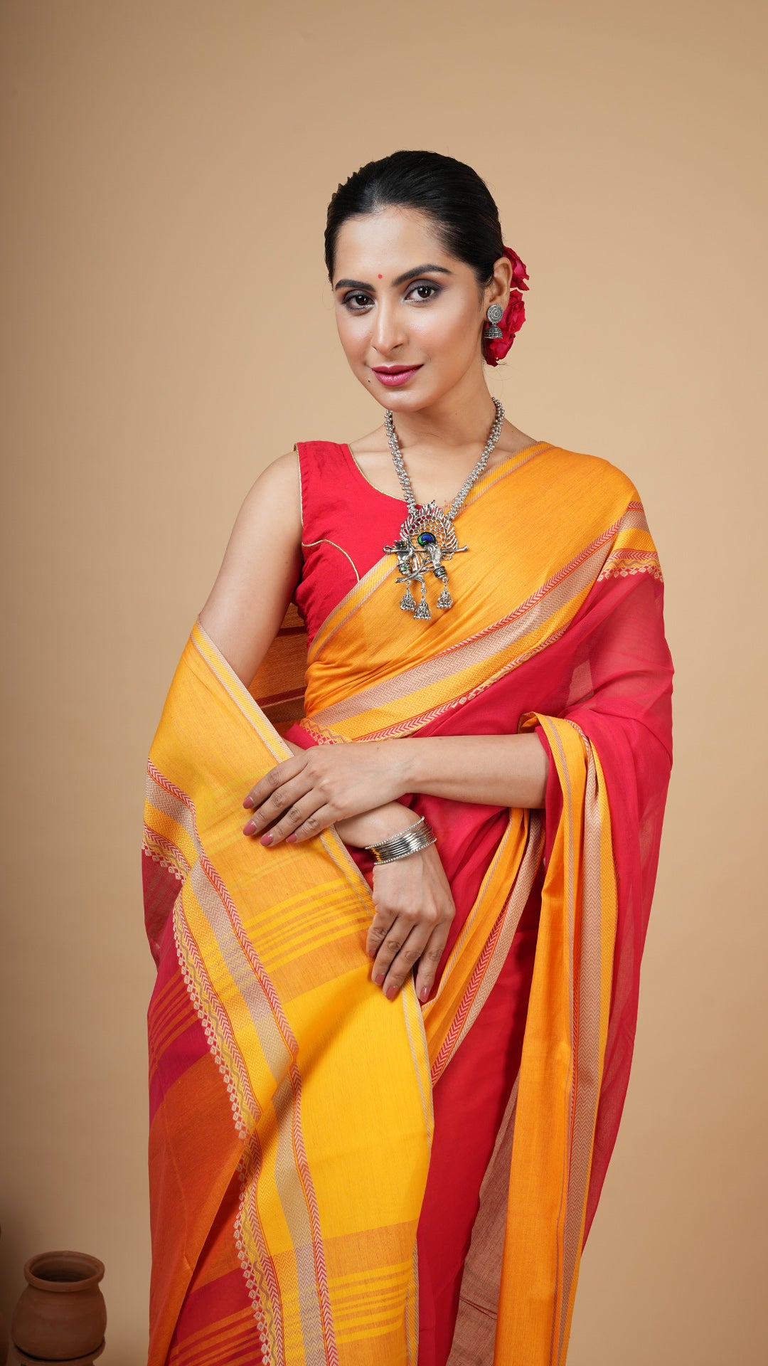 A red tangail saree