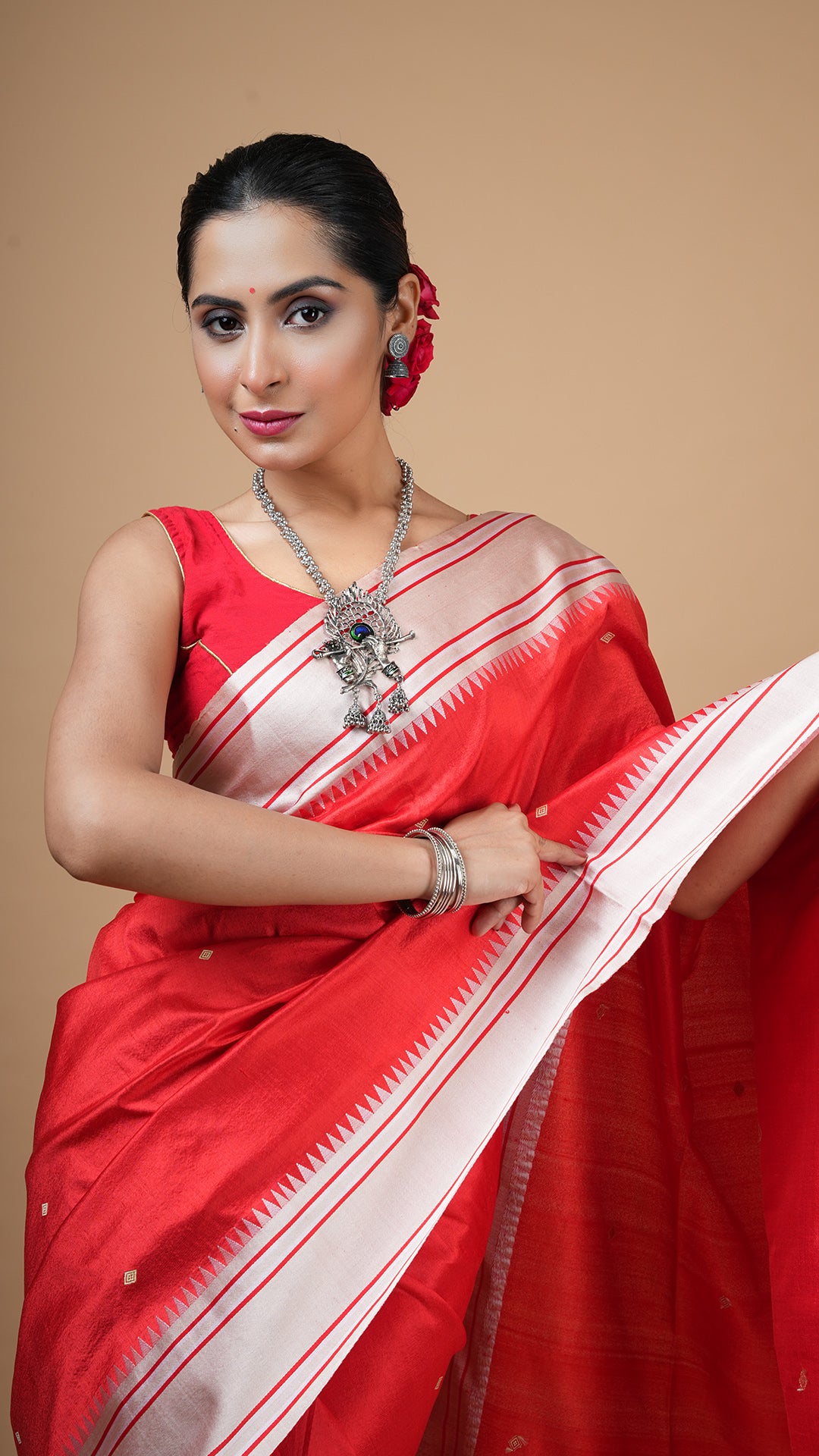 A red silk tangail saree