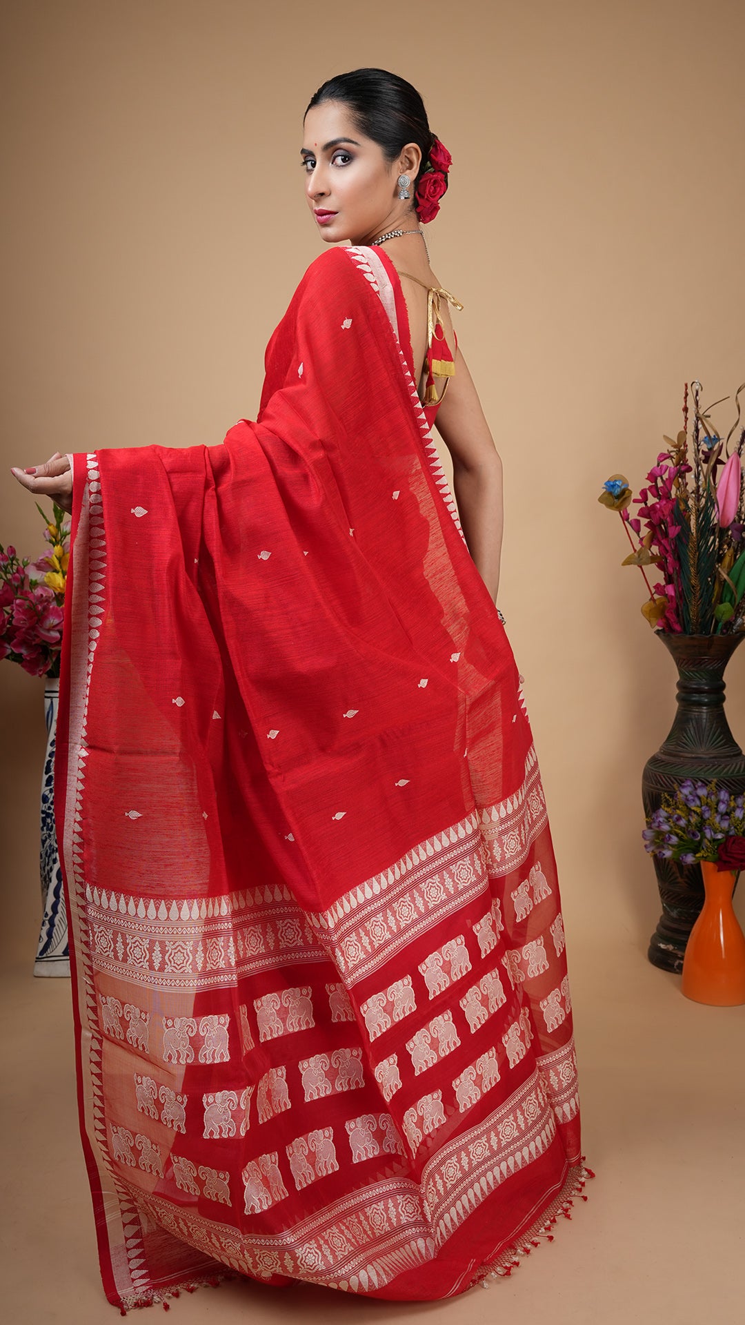 A red raw silk saree