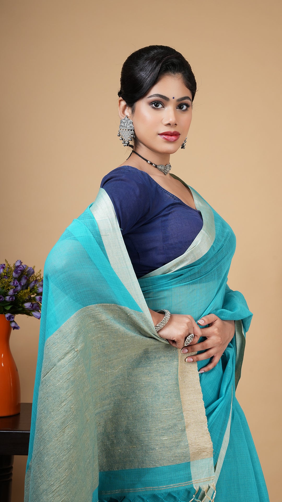 A sea green tangail saree