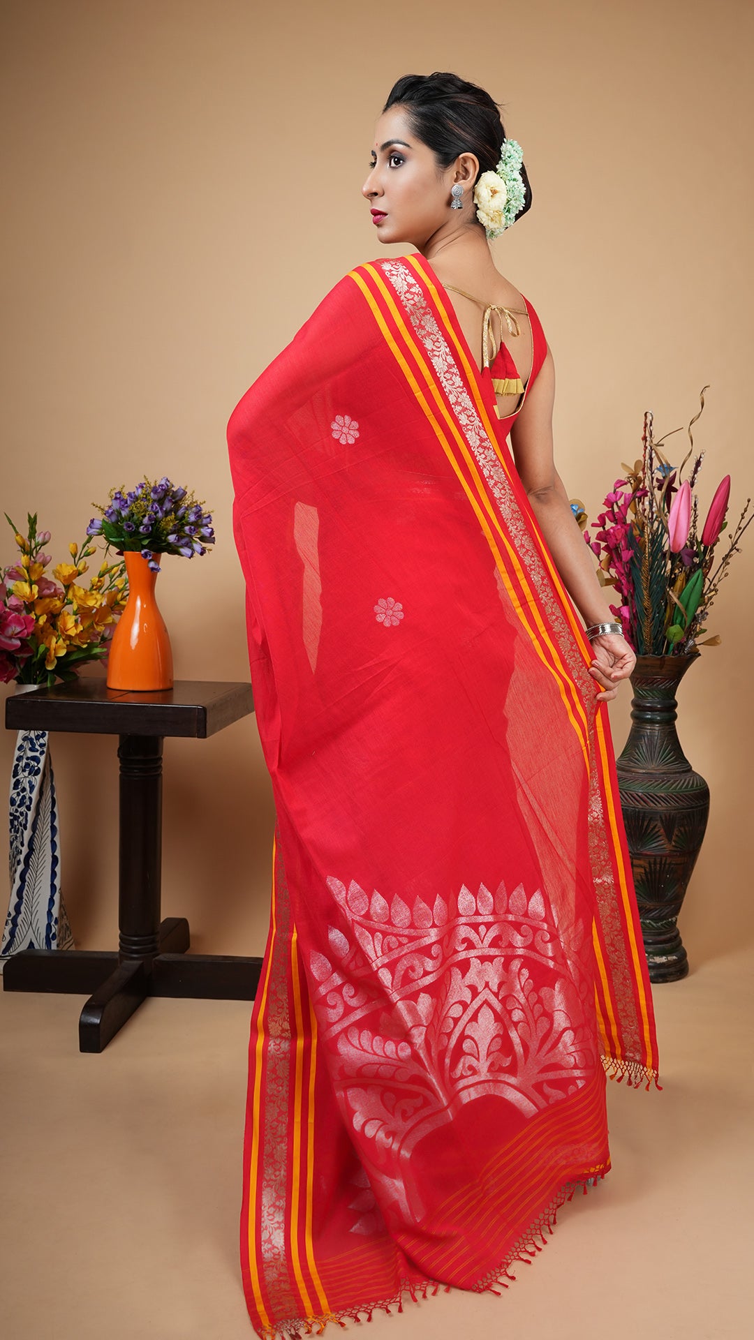 A red and gold saree