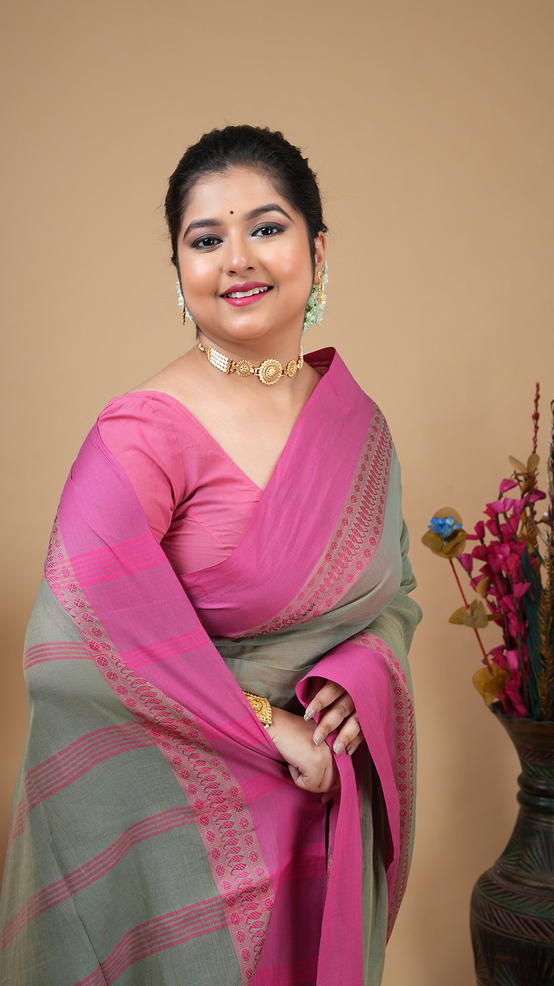 A pale pesta saree