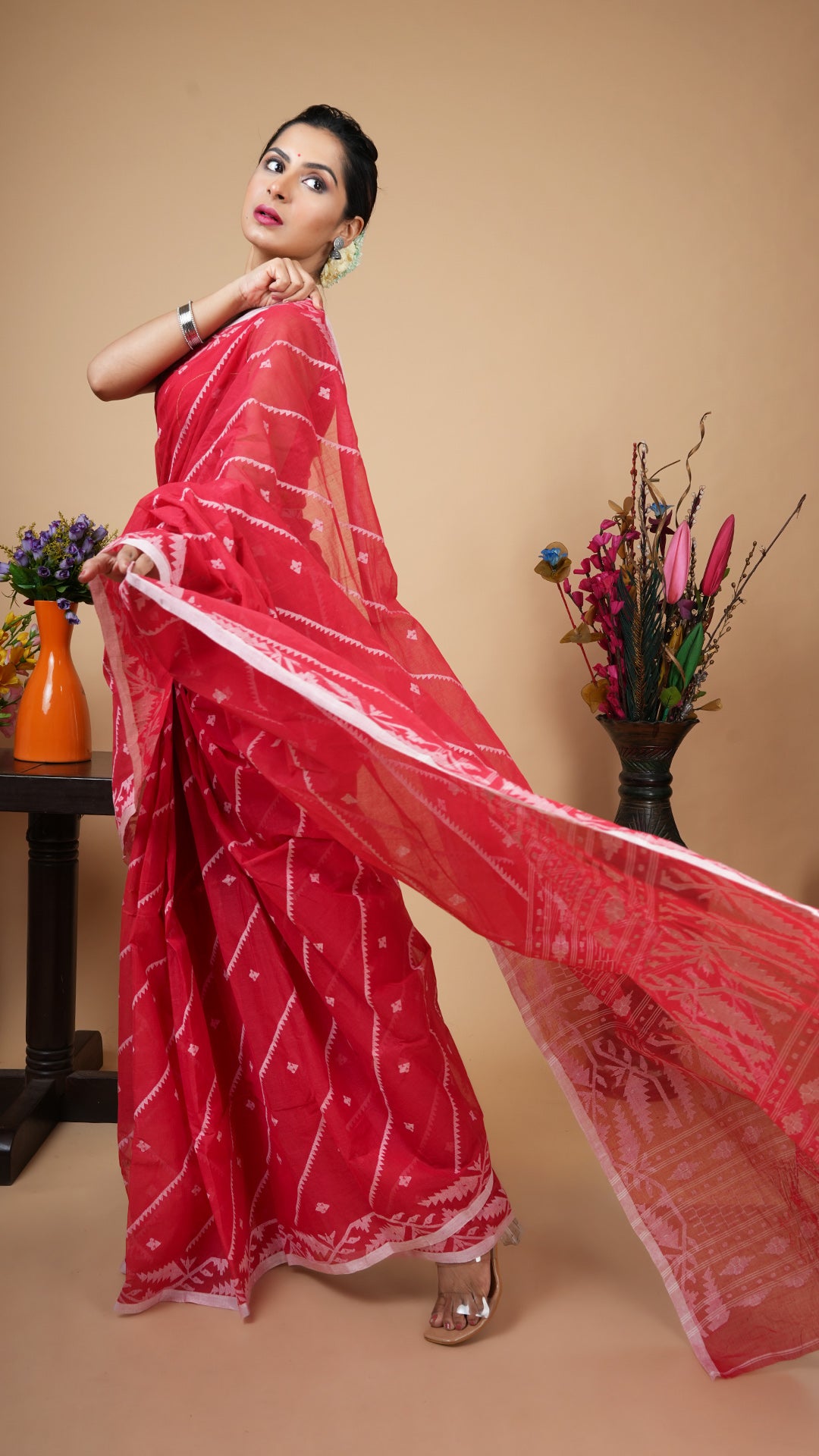 A red leheriya saree