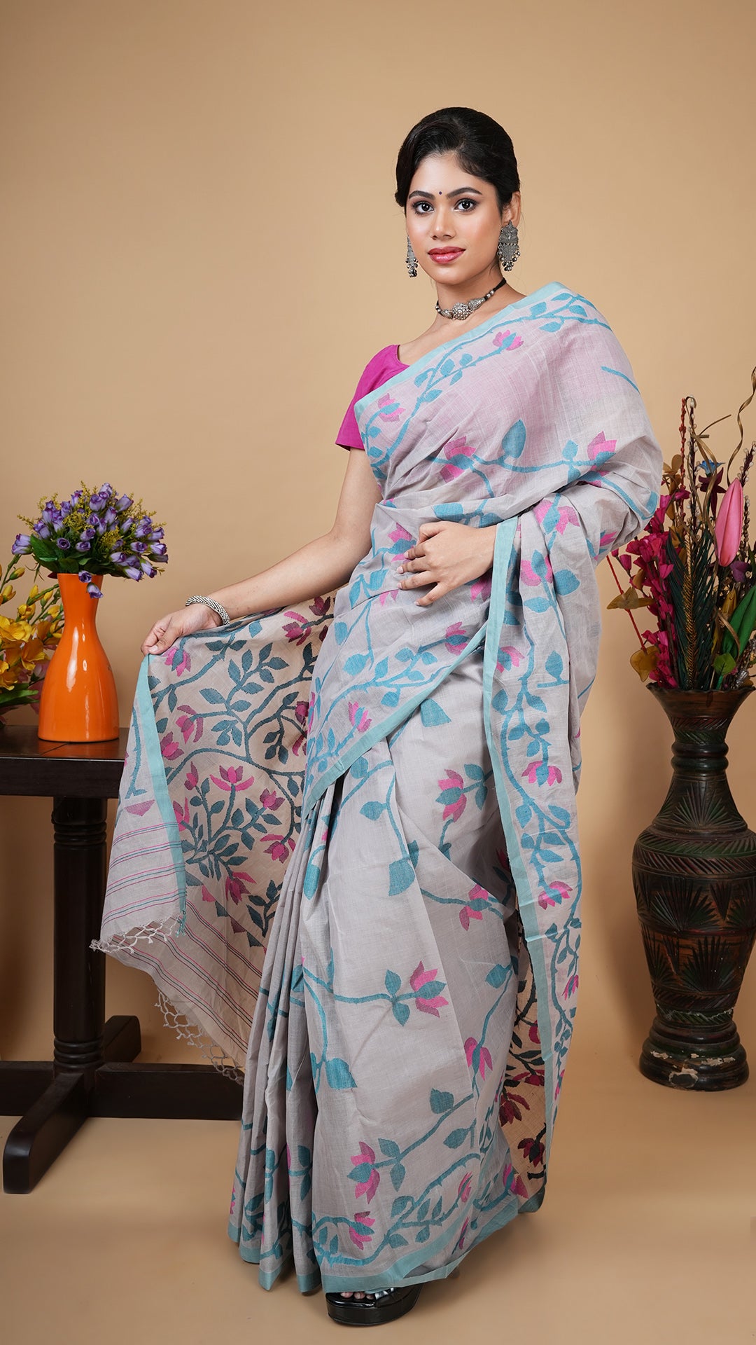 Grey cotton dhakai saree with all-over weave in green, pink and magenta on border, body and pallu. Traditional festive saree.
