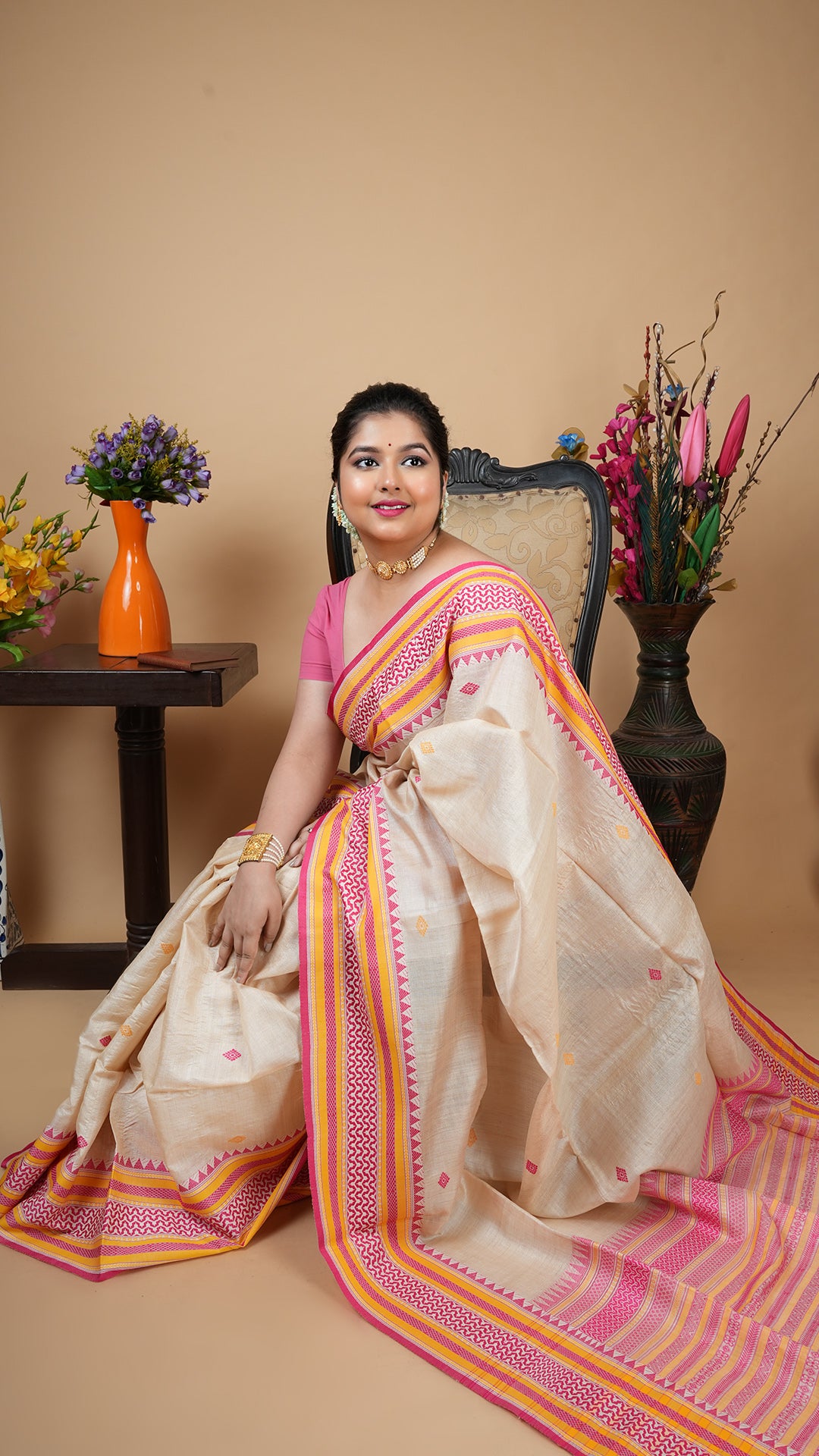 A tassar saree in pink and yellow weave