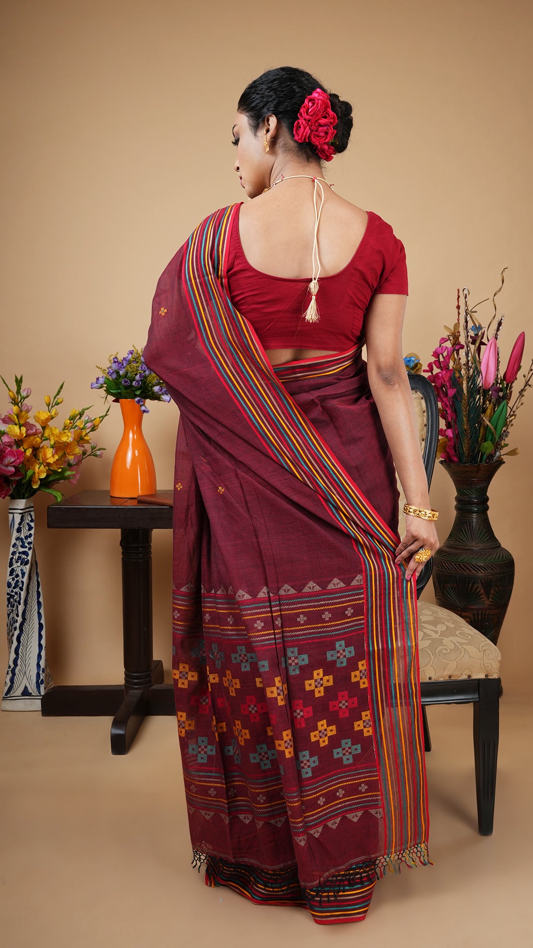 A soft tangail saree in short maroon colour