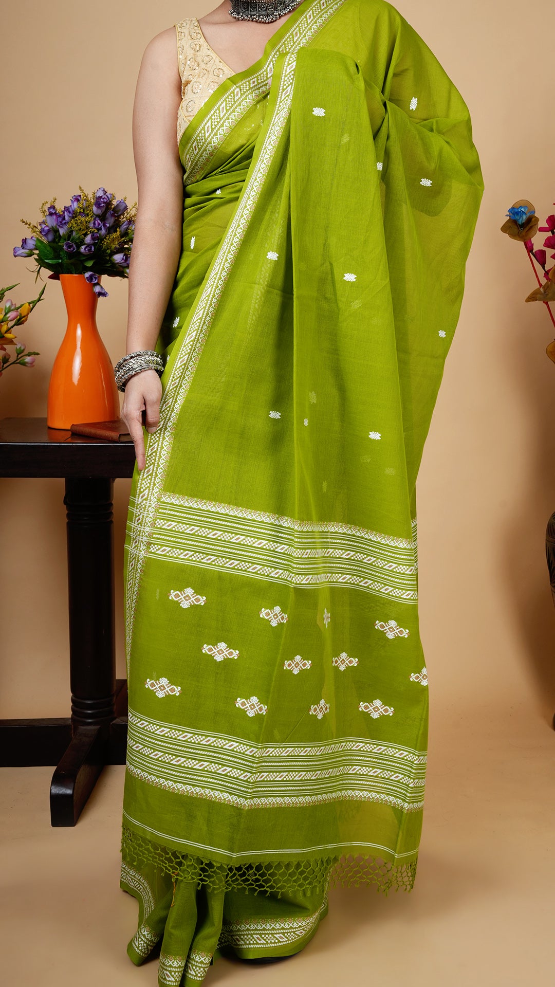 A tangail saree in mehendi green colour
