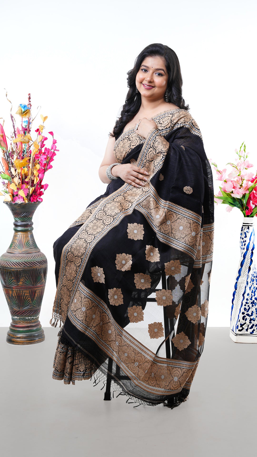 A black raw silk saree