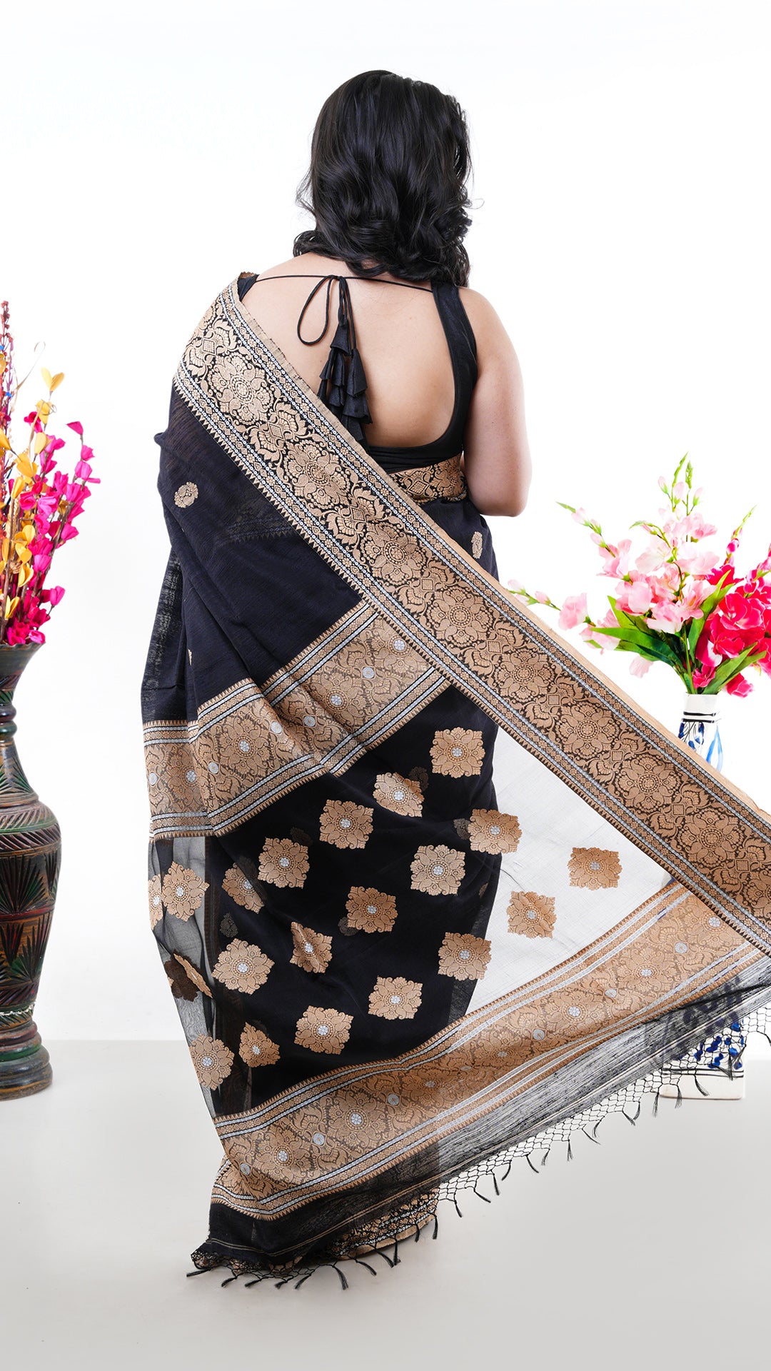 A black raw silk saree