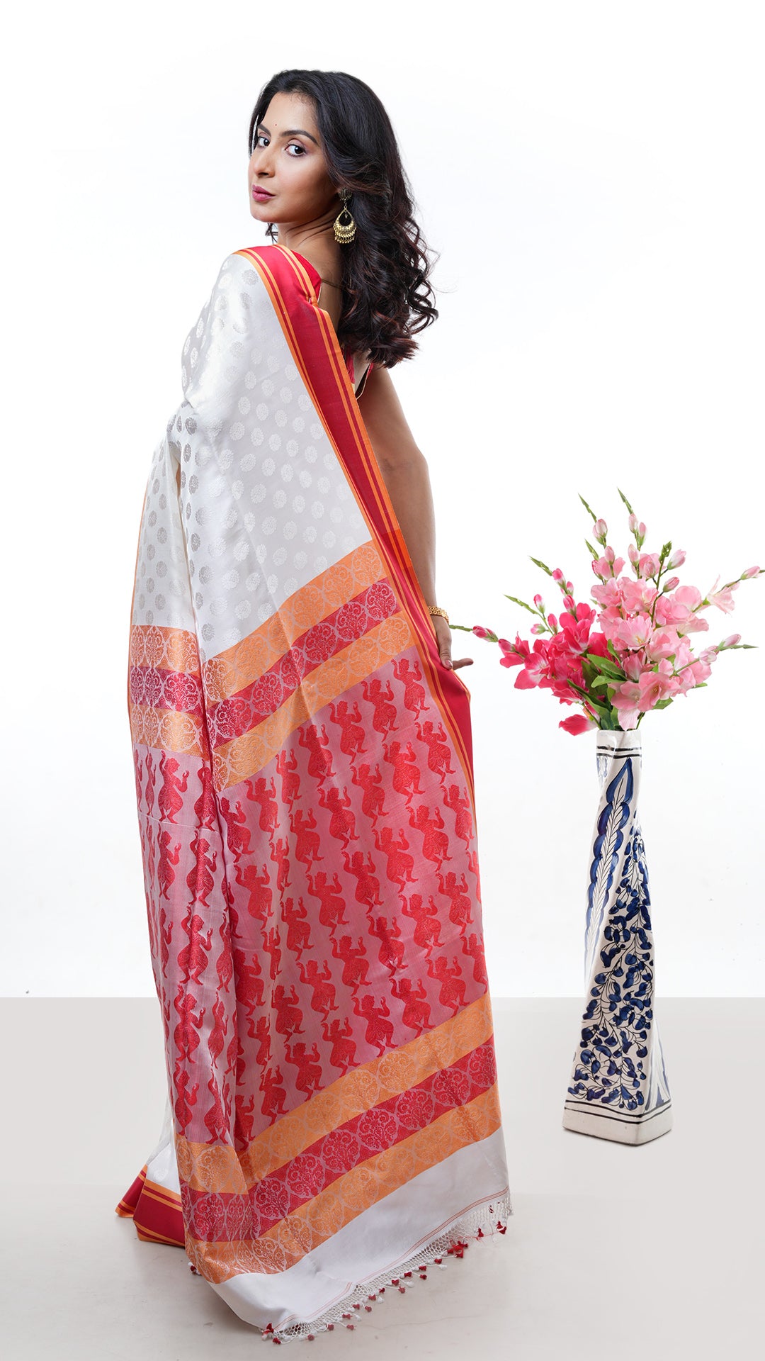 A white and red silk saree