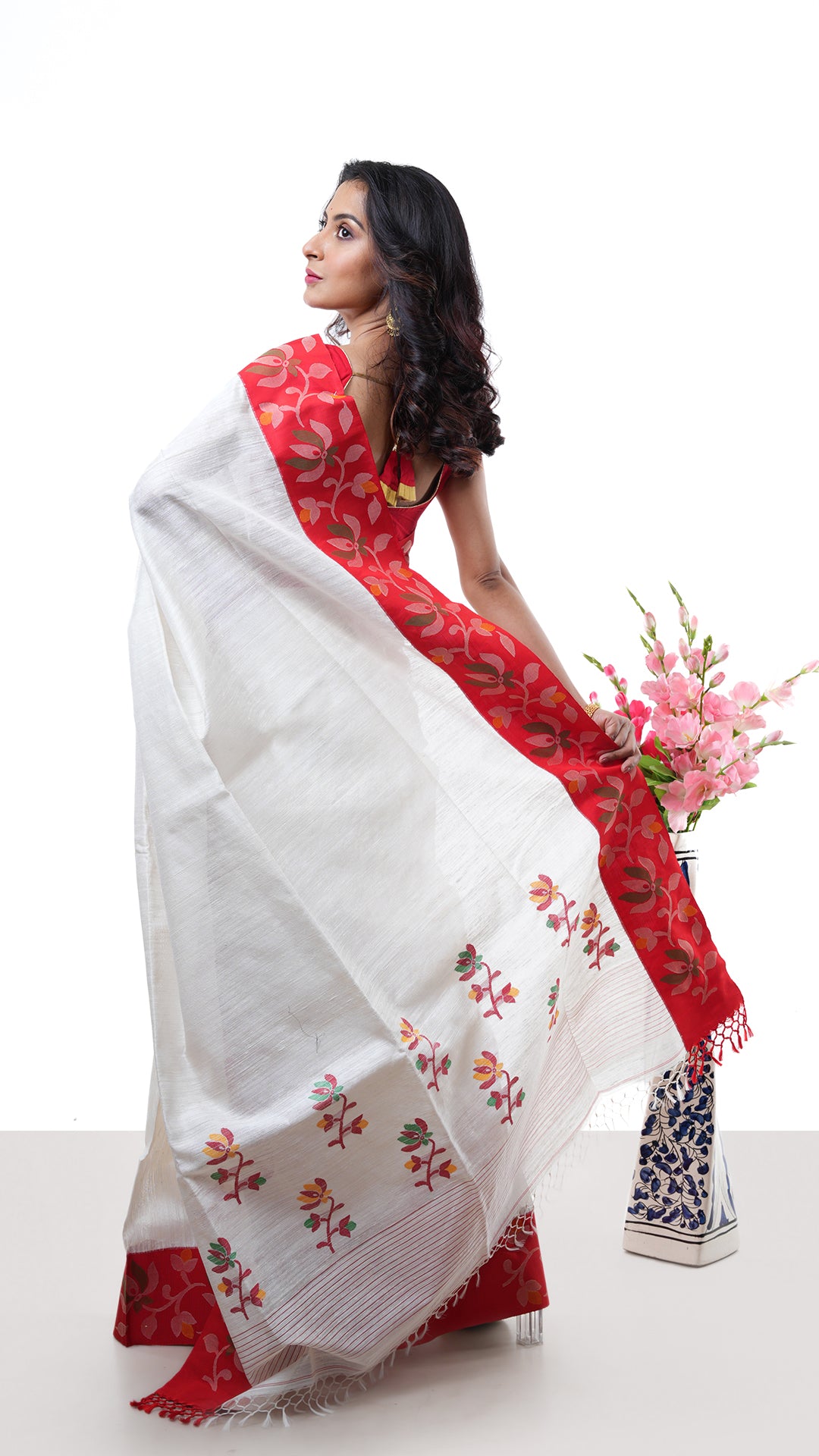 An off white with red raw silk