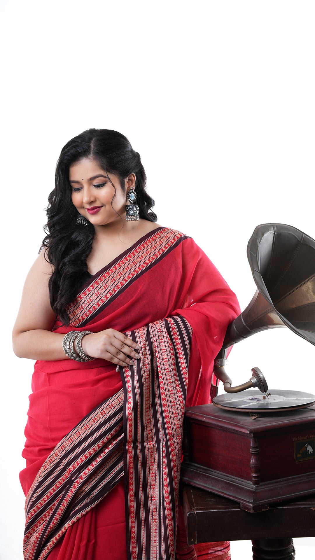 A red tangail saree in soft cotton