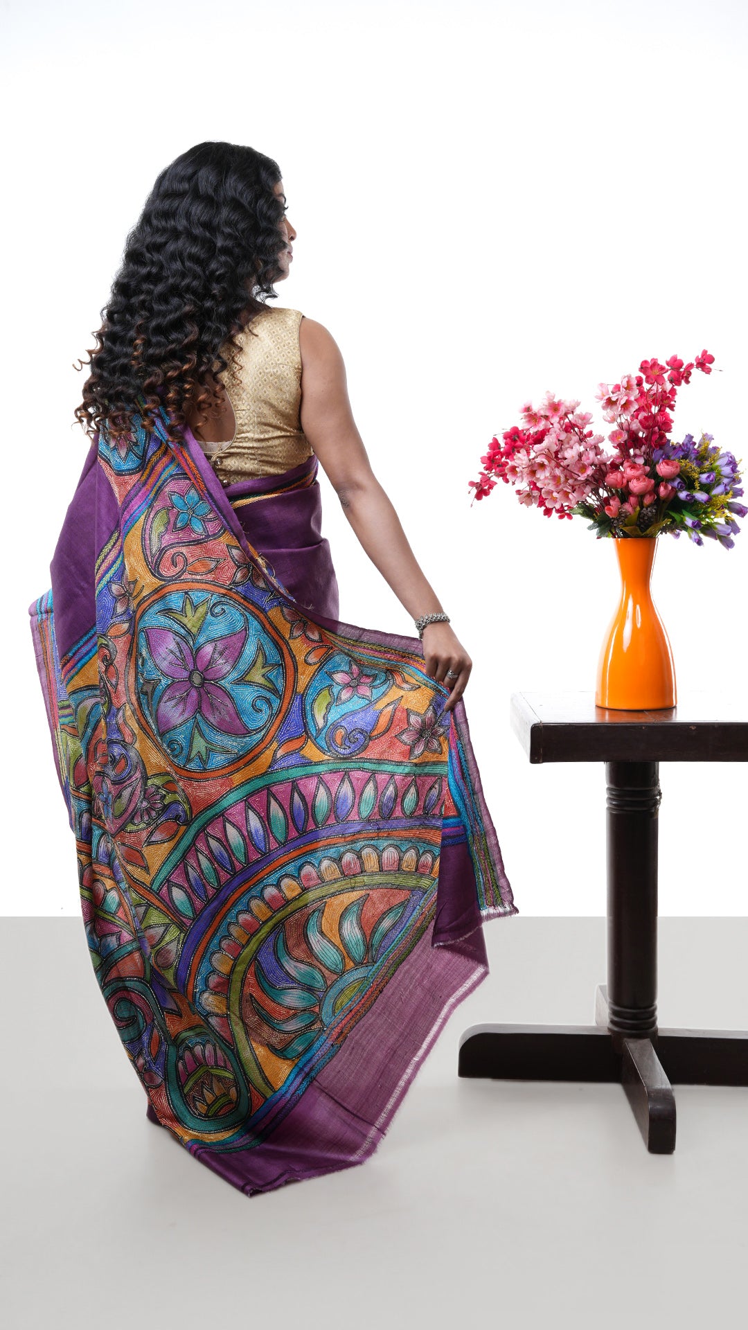 A kantha in aubergine colour