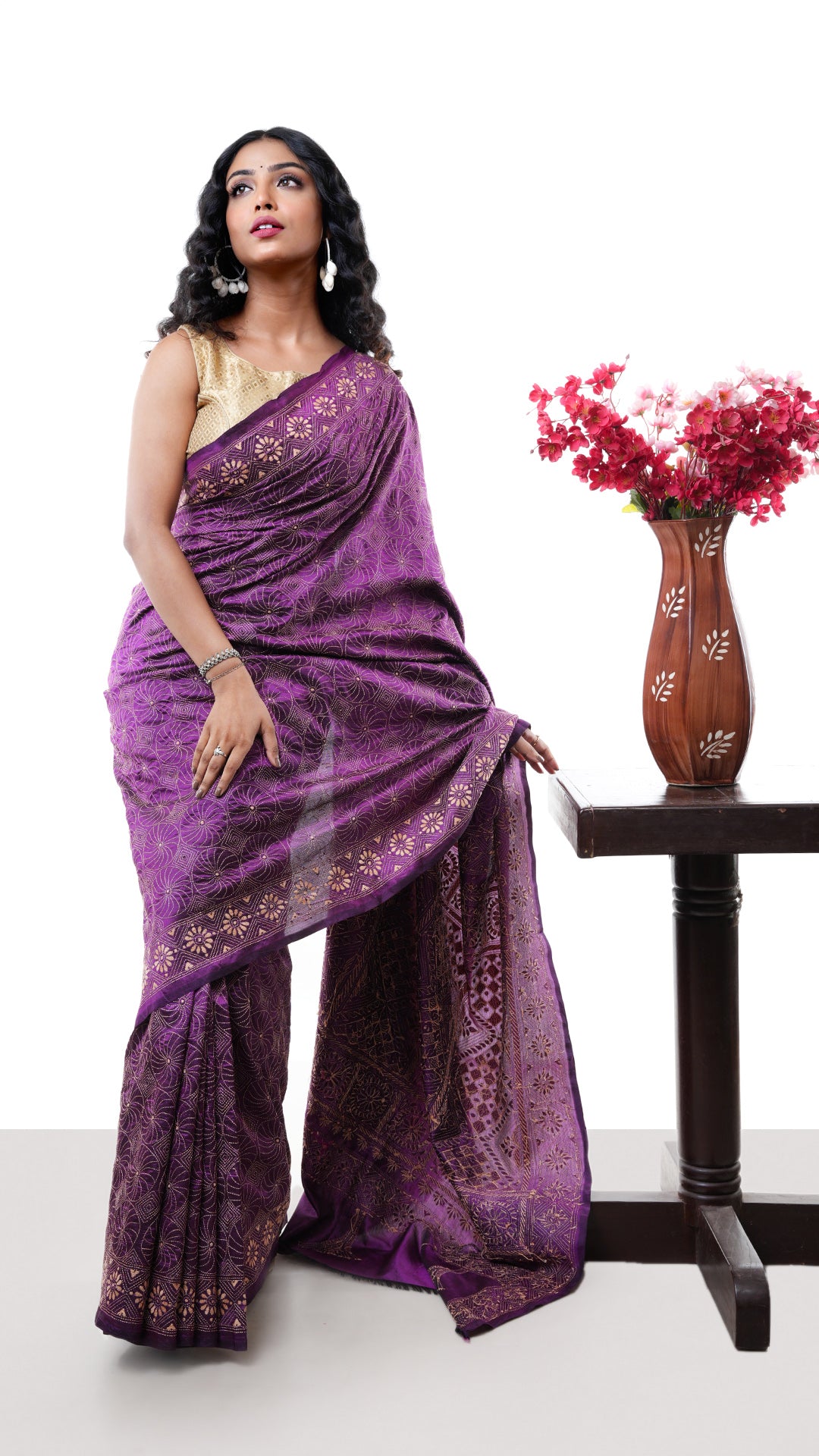 A magenta silk kantha saree. A magenta kantha embroidered silk saree. Crafted with silk Warp and weft. Standard 5.5-meter length. Includes matching blouse piece. kantha, handloom silk sari