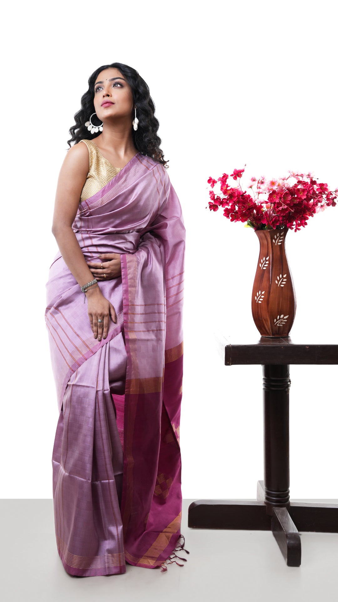 A silk saree in cinnamon colour