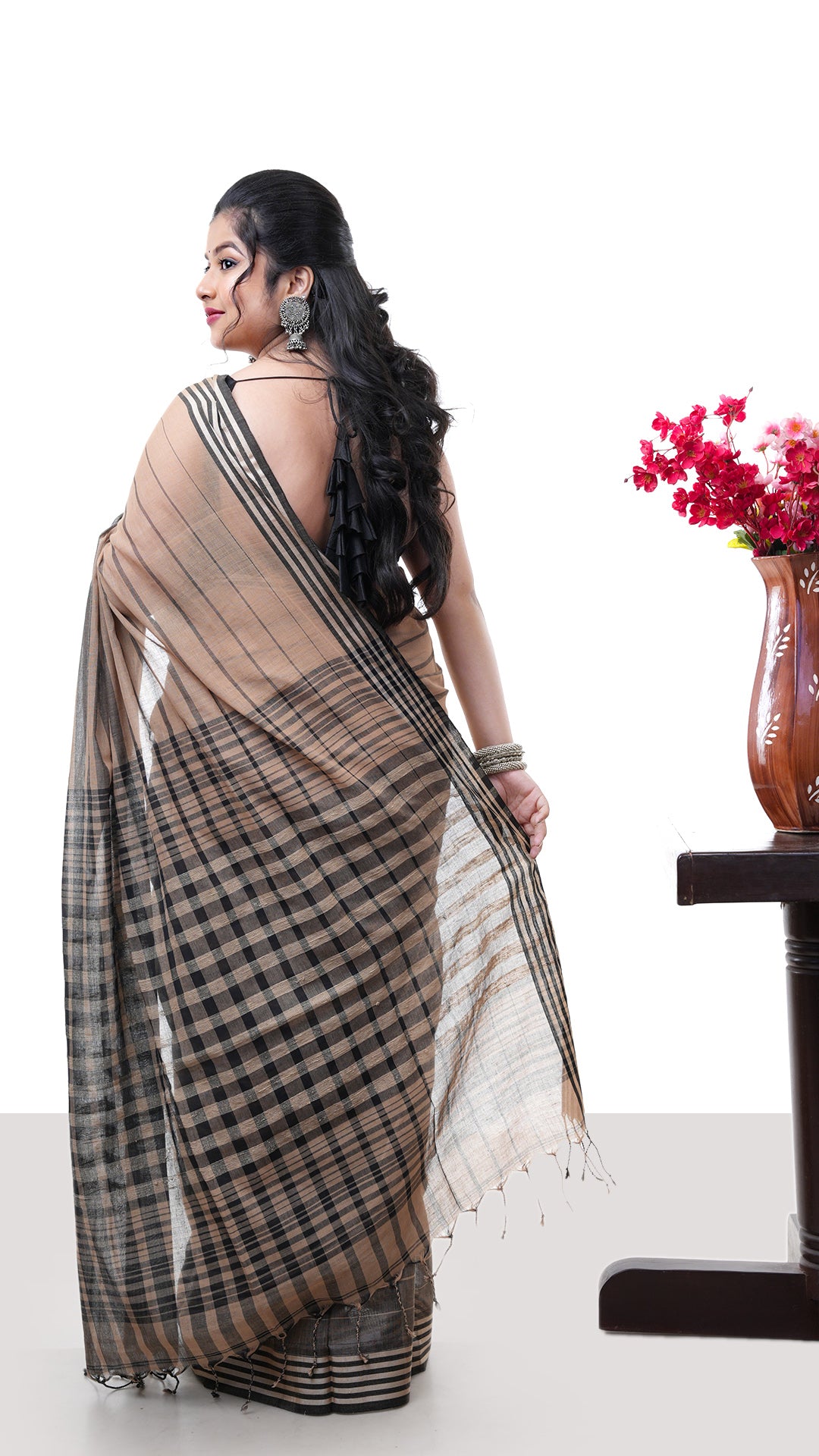 A beize and black tangail saree