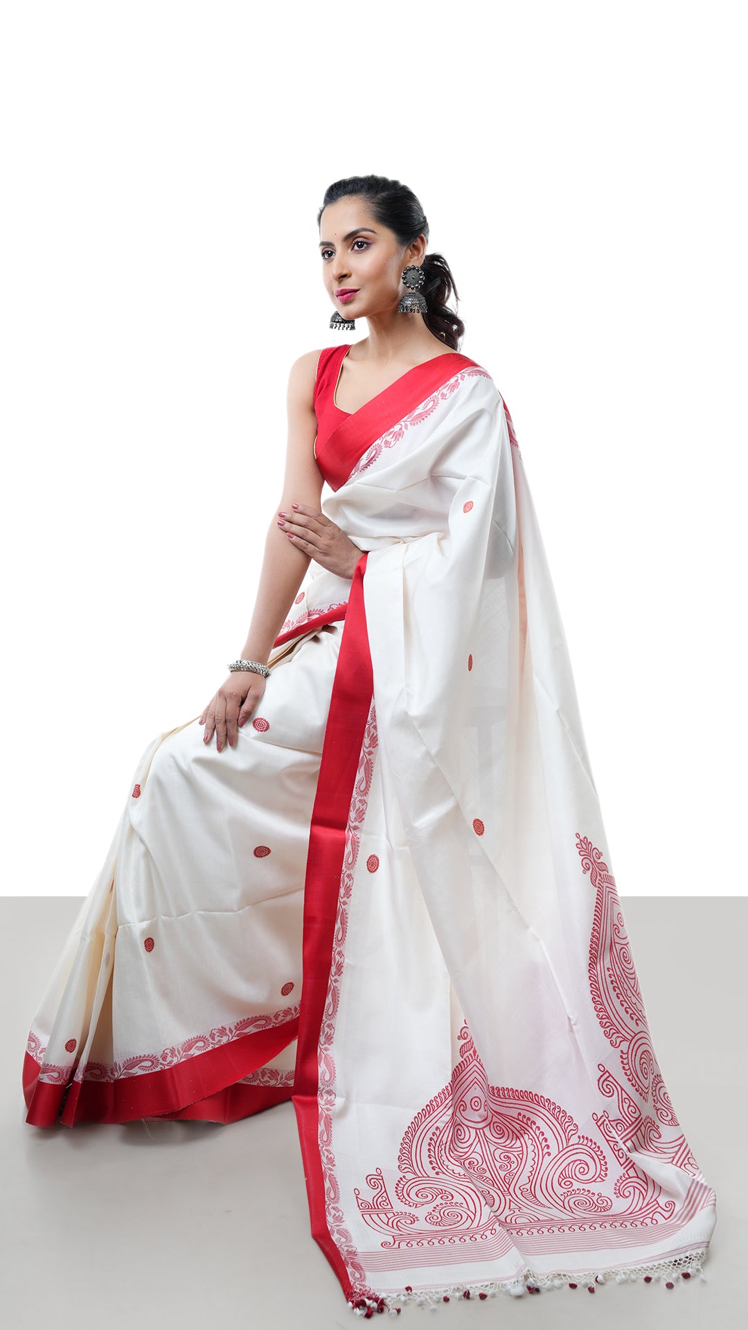 A silk saree in off white and red