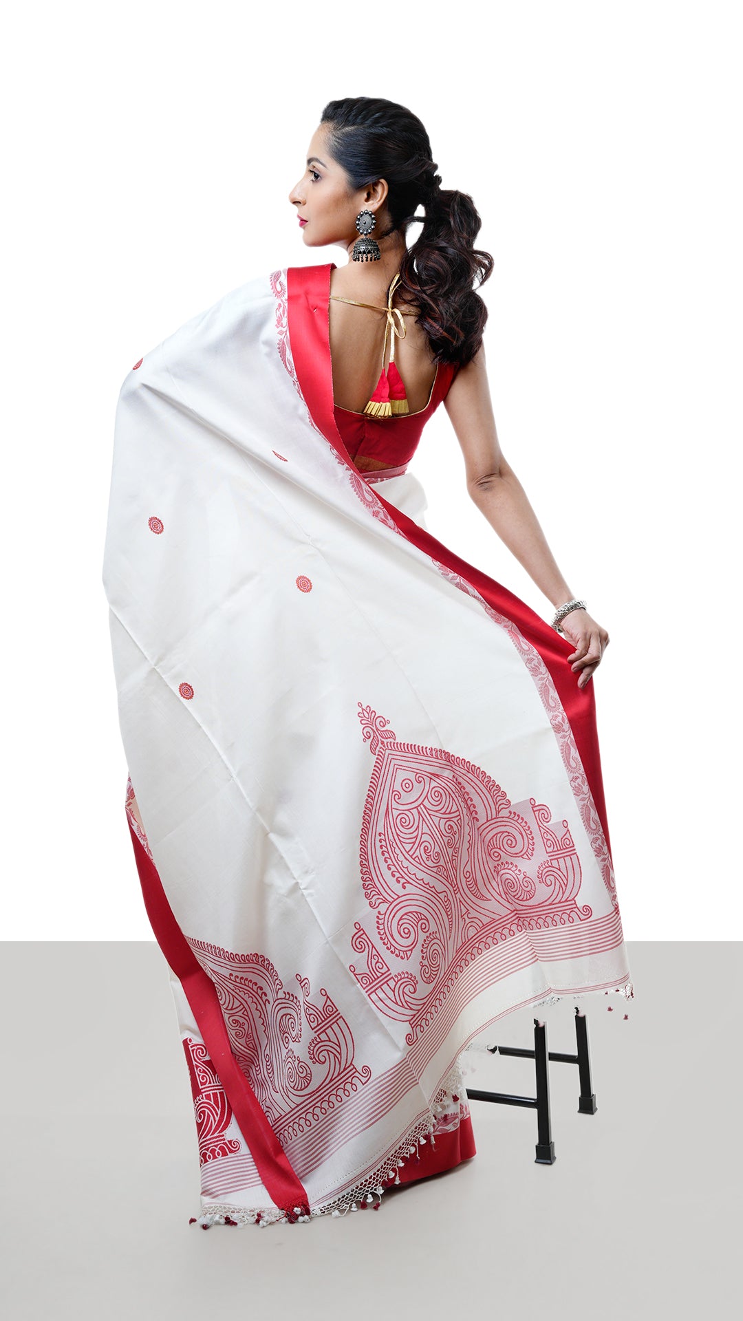 A silk saree in off white and red
