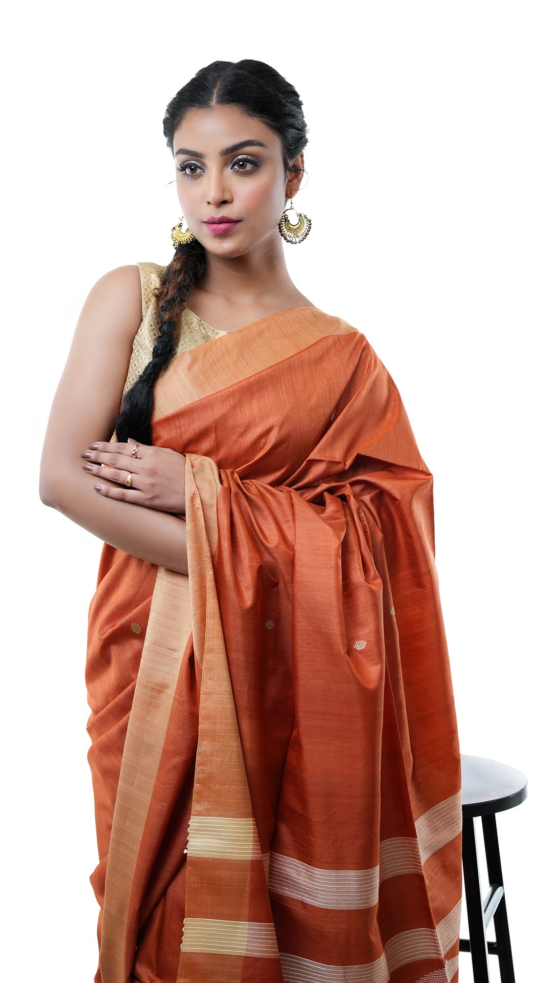 A tassar saree in rust colour