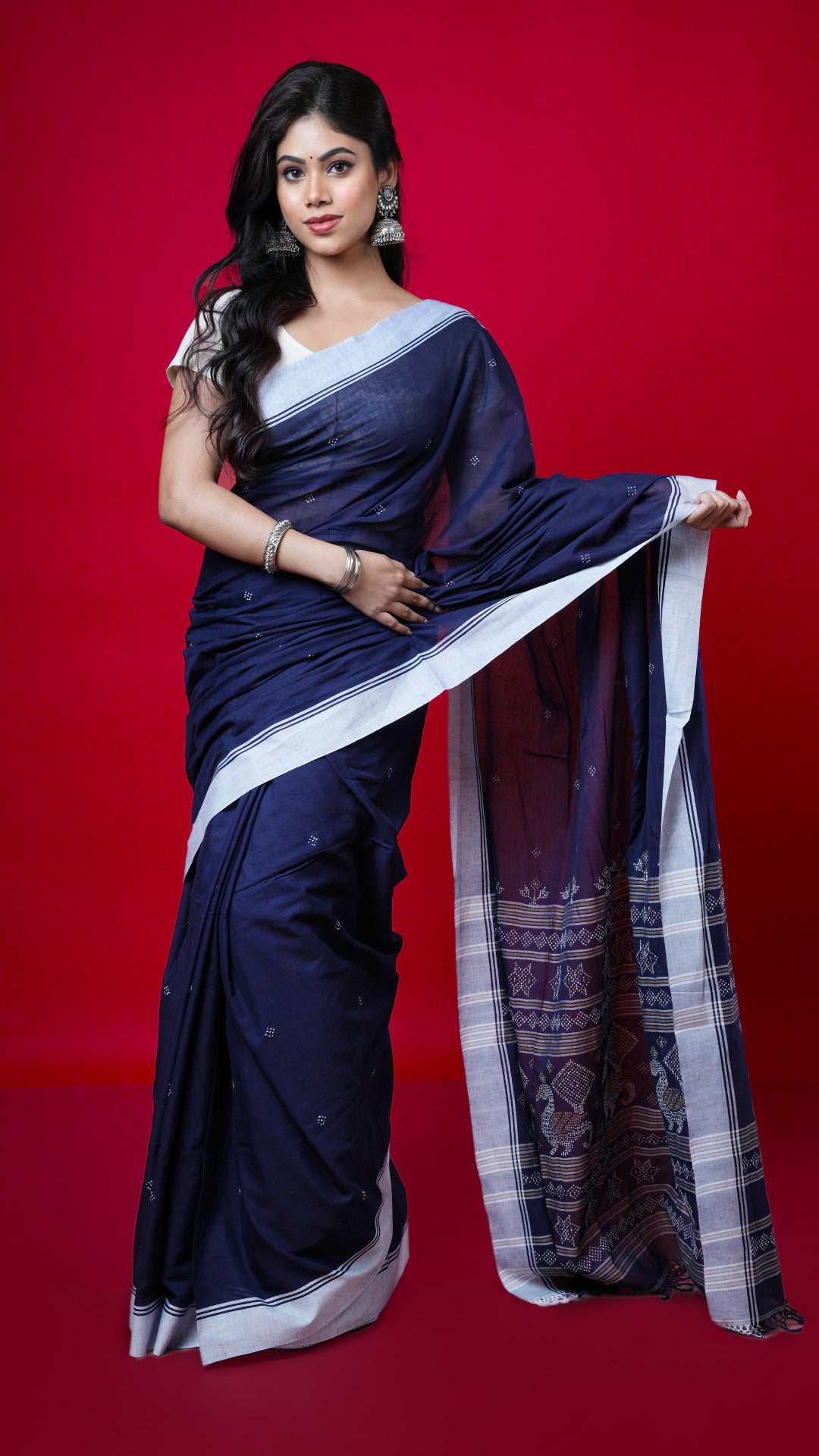 A navy blue tangail saree