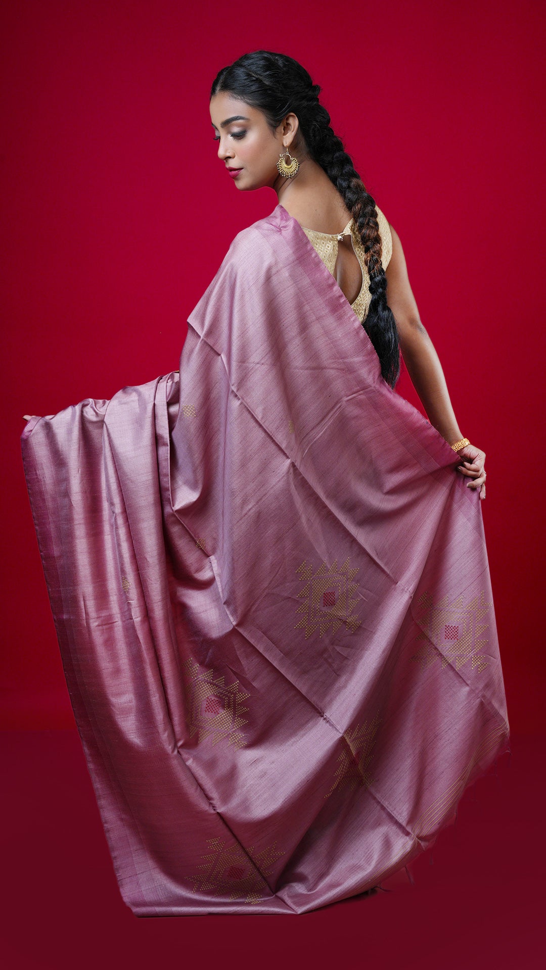 A tassar saree in onion peel colour