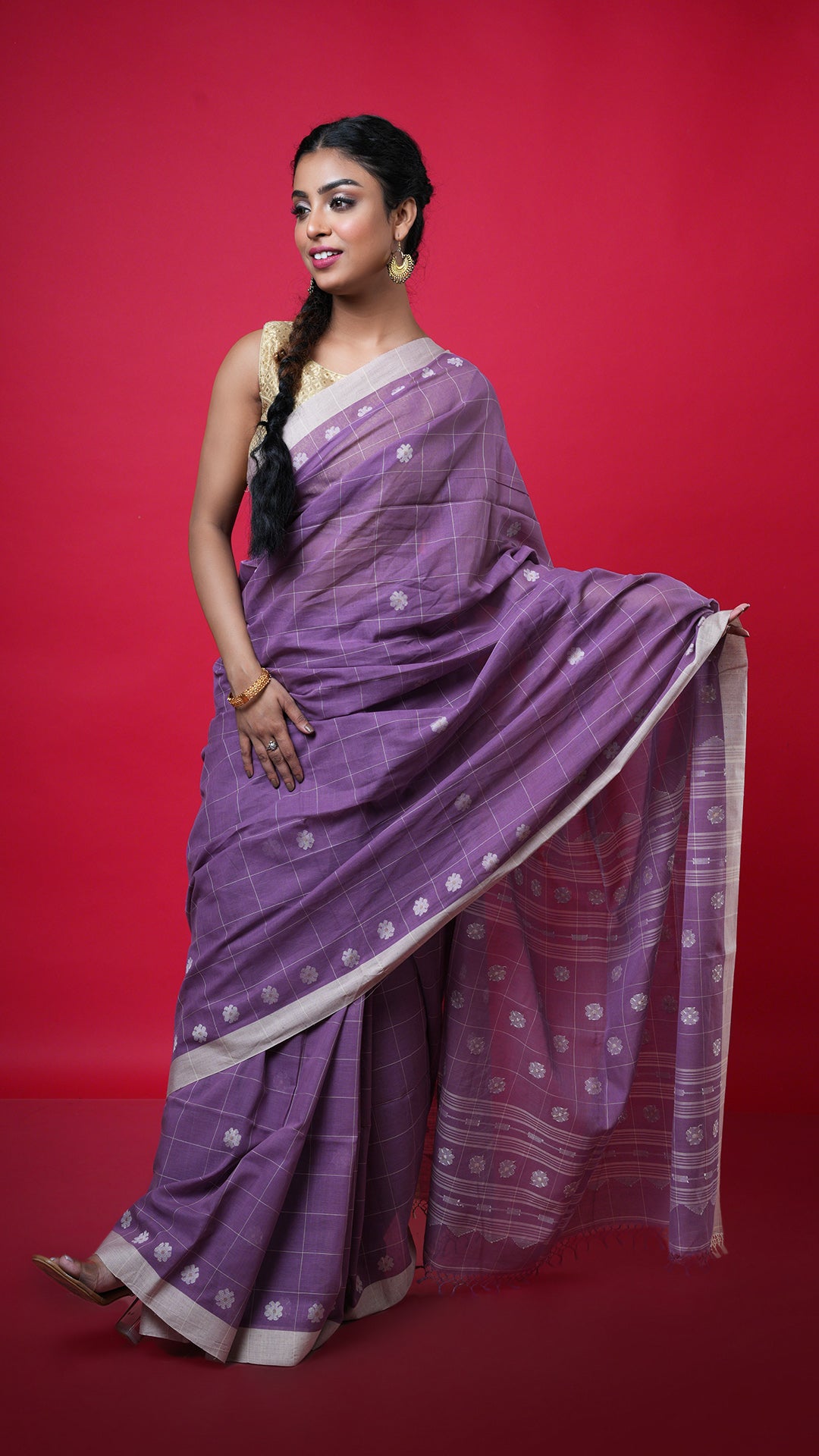 A dark mauve coloured tangail saree. A soft cotton tangail saree in warm mauve shade. Crafted with soft cotton Warp and weft. Standard 5.5-meter length. Includes matching blouse piece. Tangail saree, cotton saree.