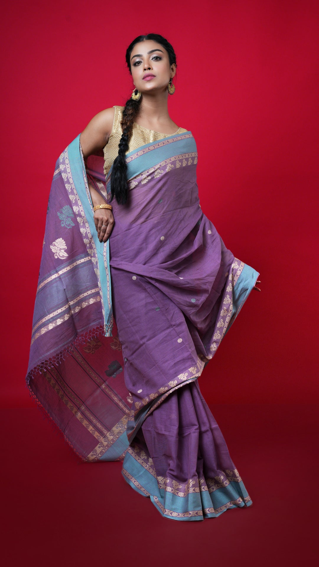 A dark mauve soft cotton saree. A dark mauve soft cotton sari with subtle pattern. Crafted with soft cotton Warp and weft. Standard 5.5-meter length. Includes matching blouse piece. cotton saree
