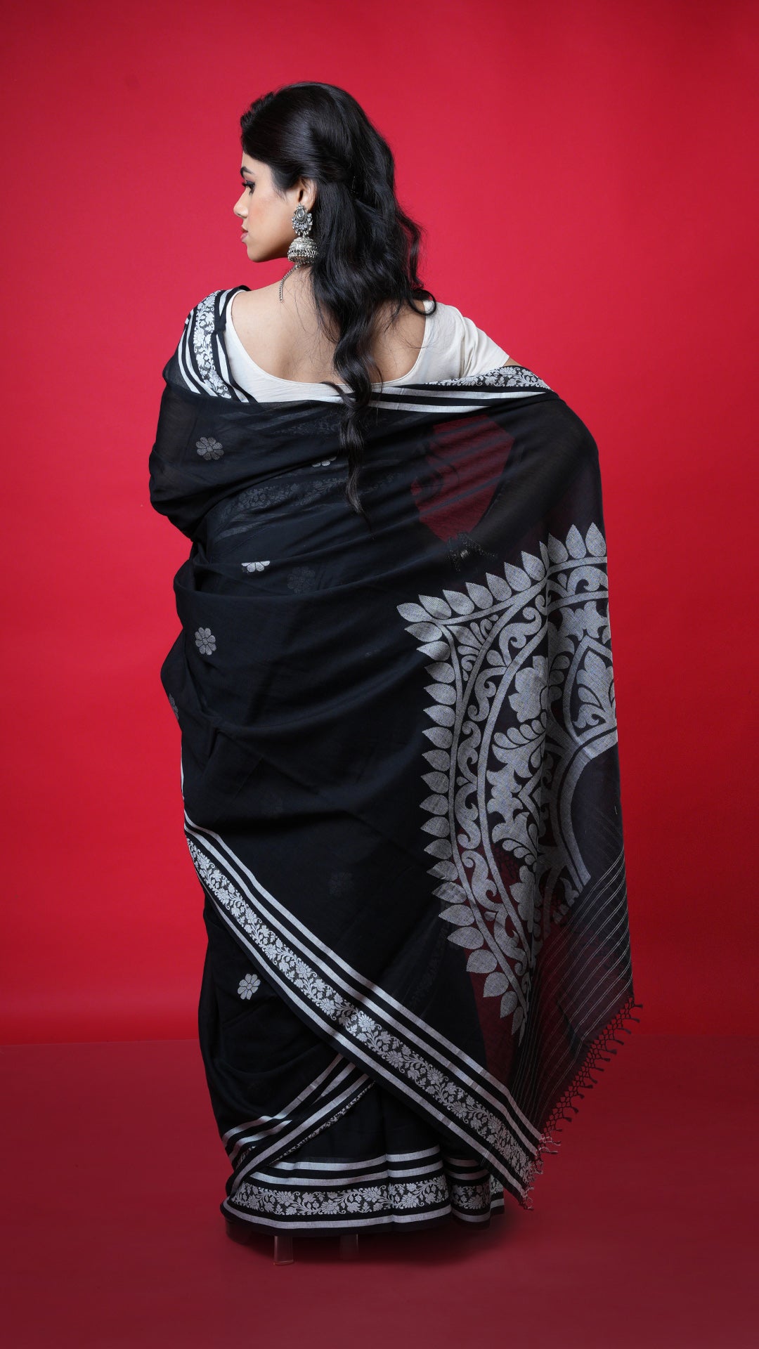 A black and white soft tangail saree