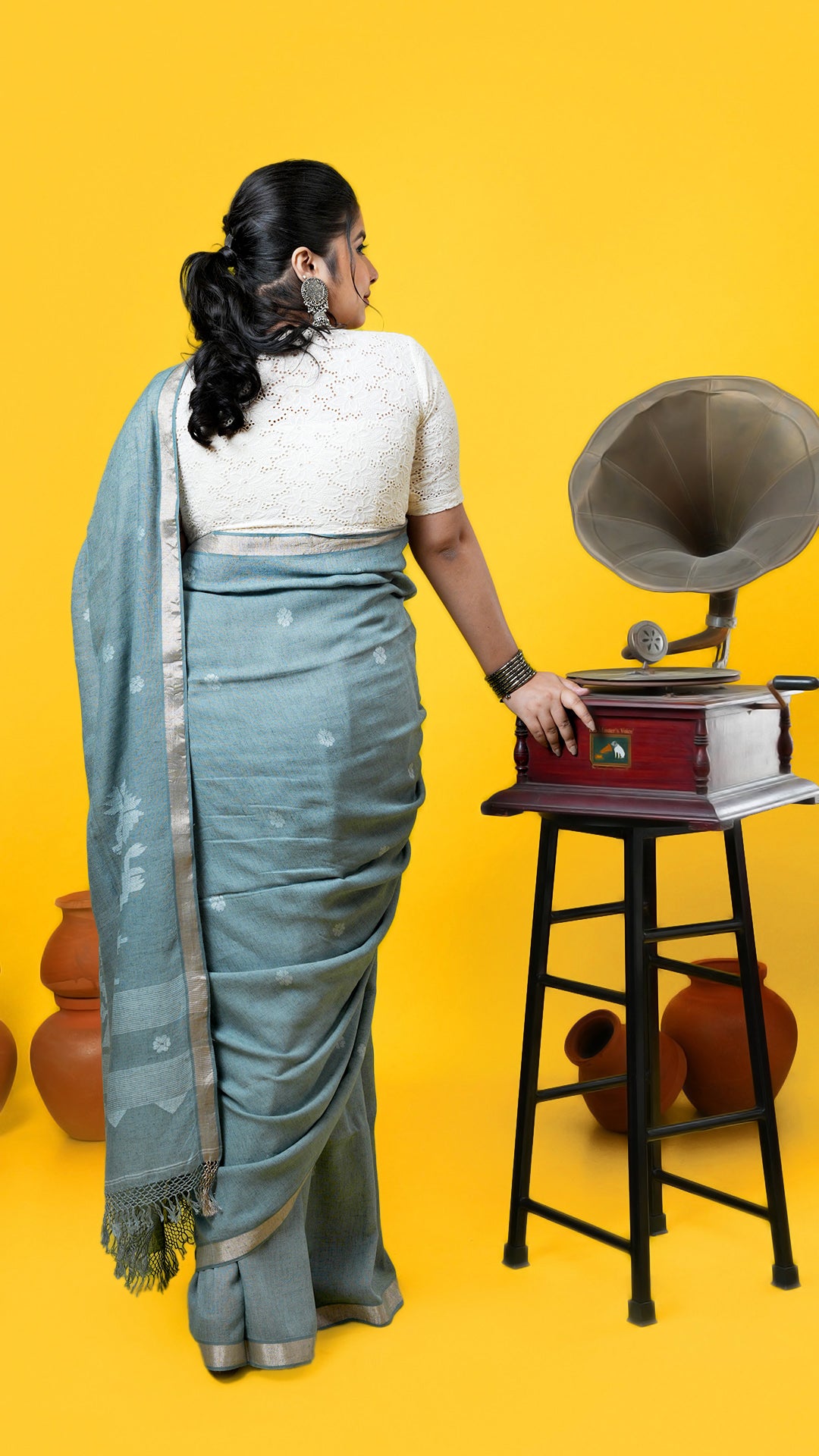 A pale green coloured linen saree