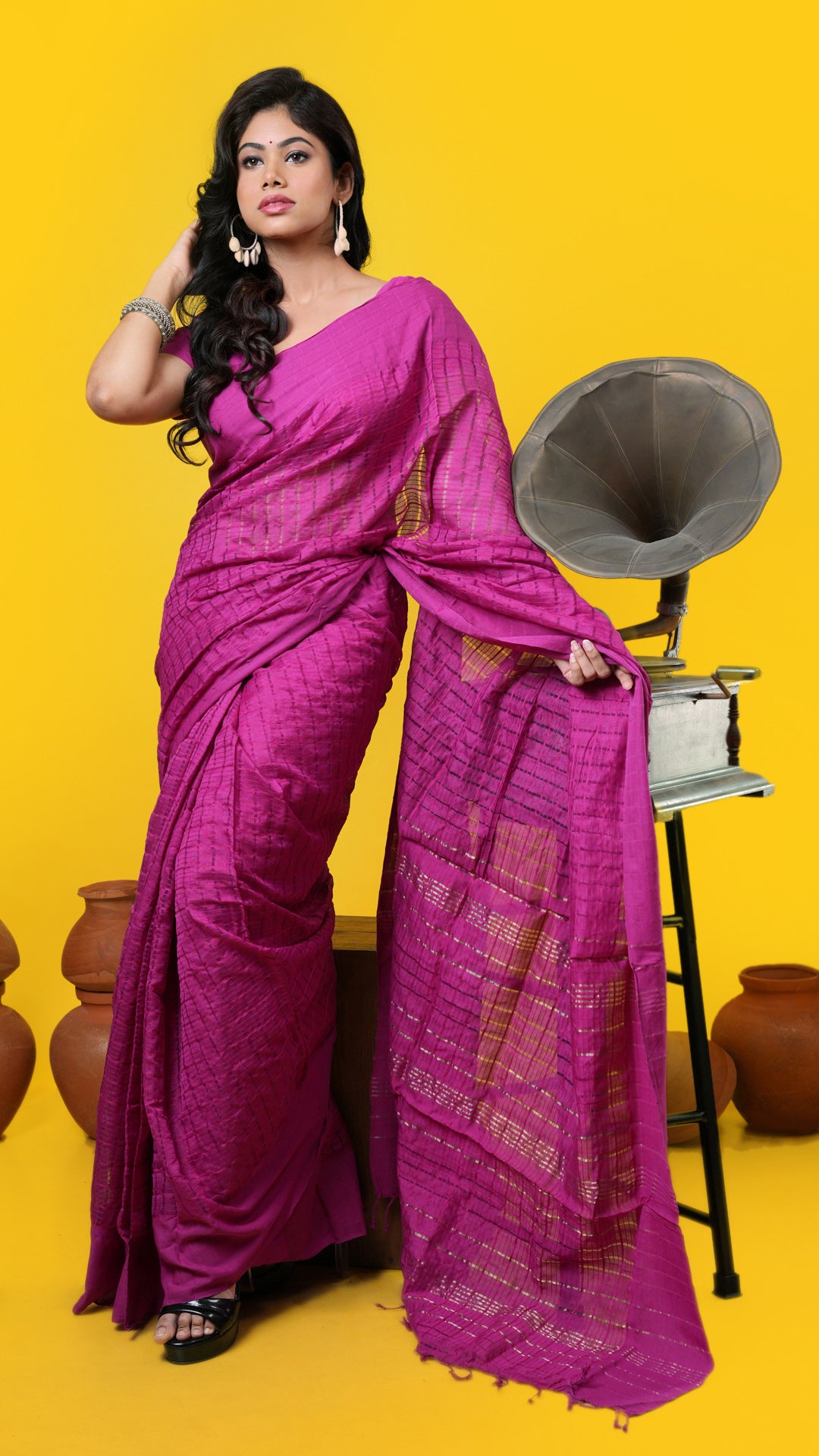 A tangail saree in magenta colour, made of Silk and mercerised cotton Warp and Silk and mercerised cotton weft. Perfect for traditional, office, regular, gifts, this saree includes no blouse piece. Price: Rs. 2000/-. Category: Tangail, tant, jaquard.