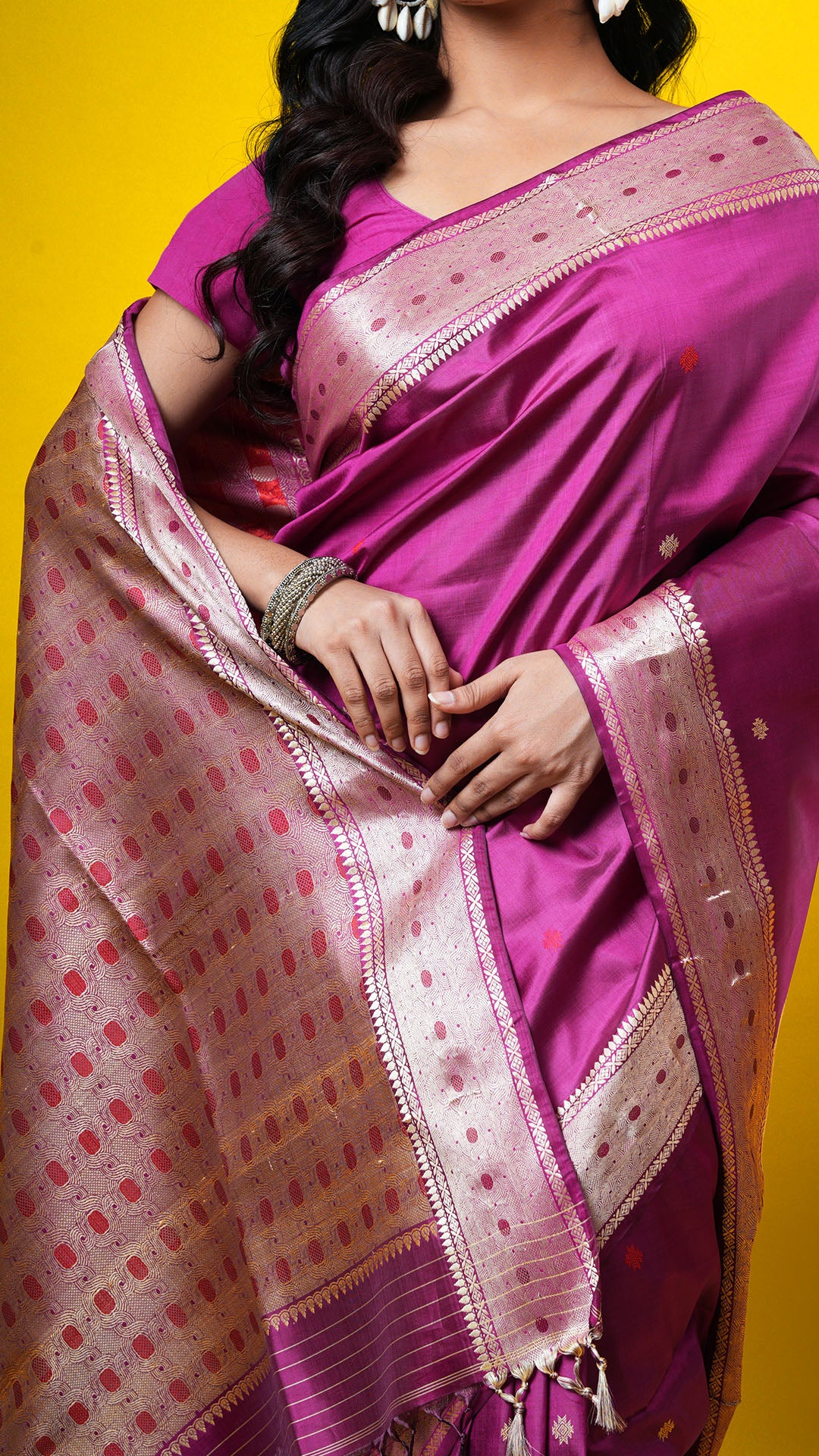 A magenta coloured tangail silk saree