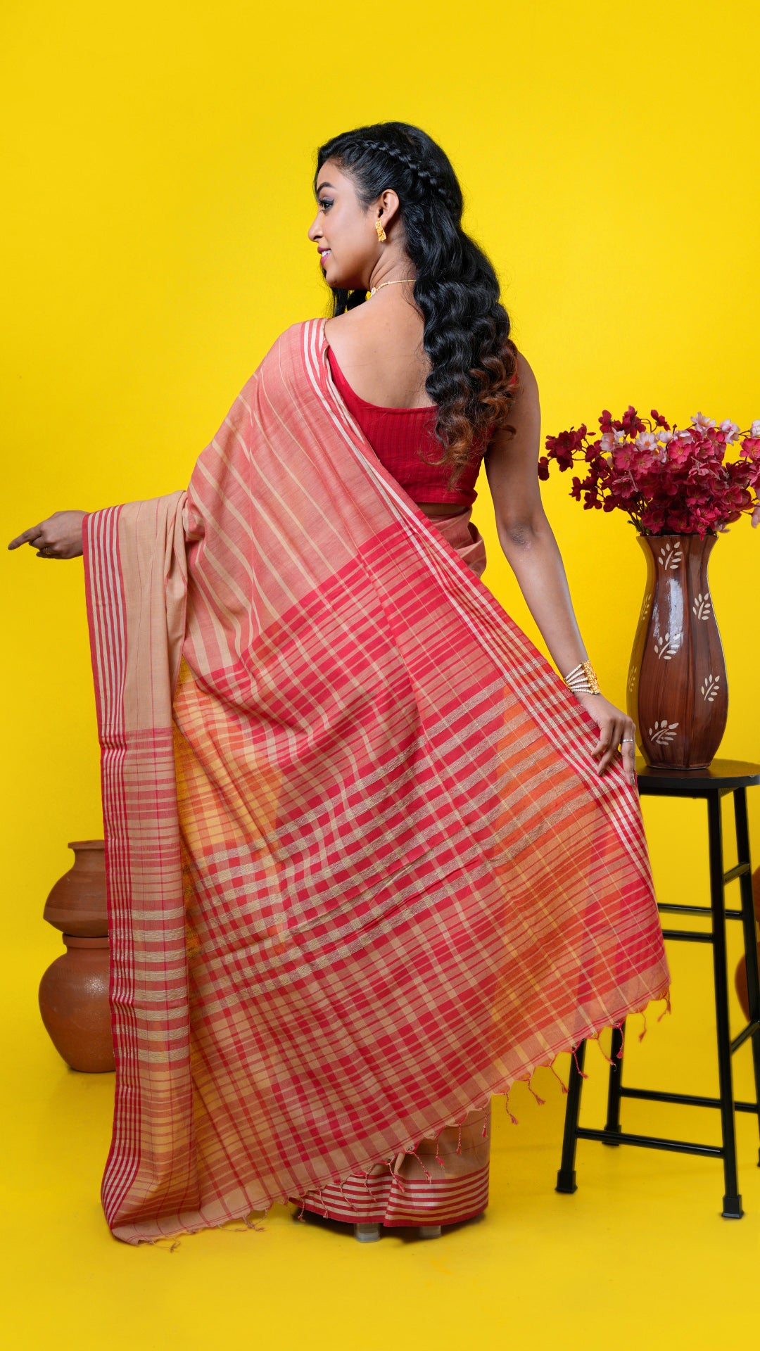 A beize and red tangail saree